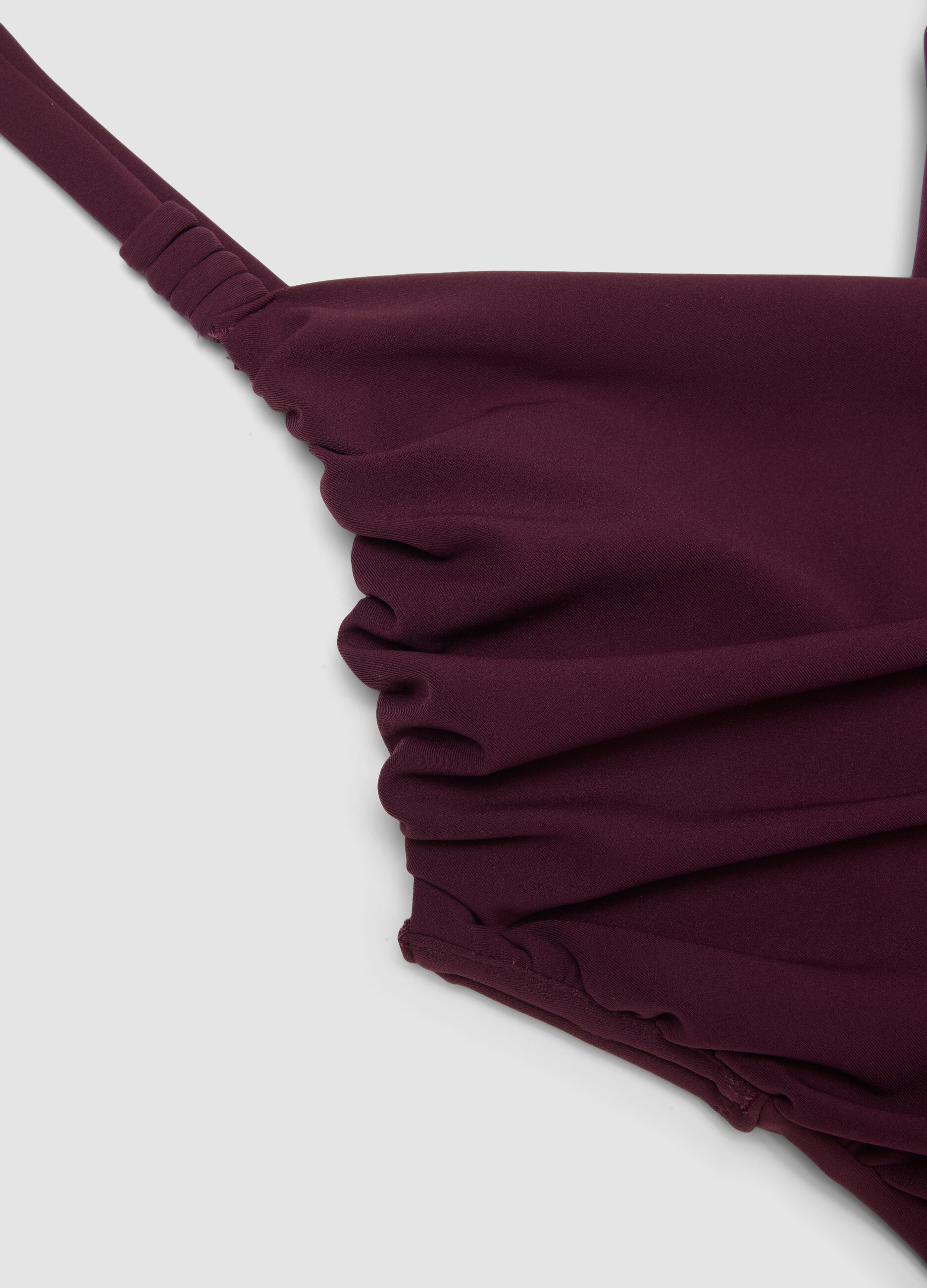 Purple draped stretch swimsuit with shaping effect