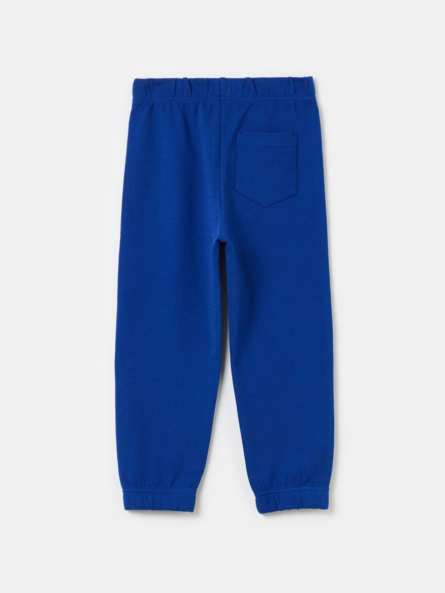 Fleece joggers with elasticated edging and print_1