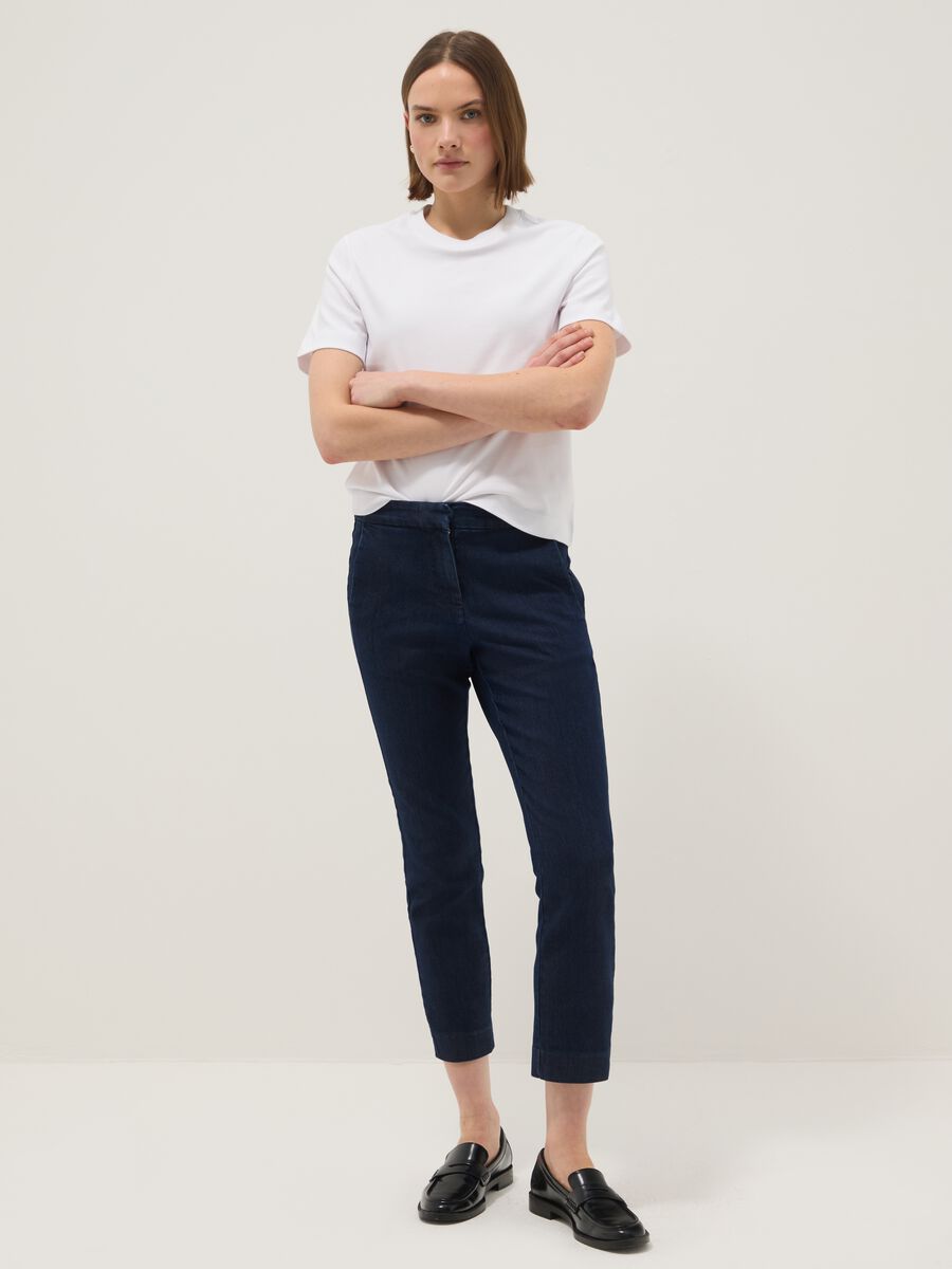 Blue slim fit stretch denim cotton blend trousers_0