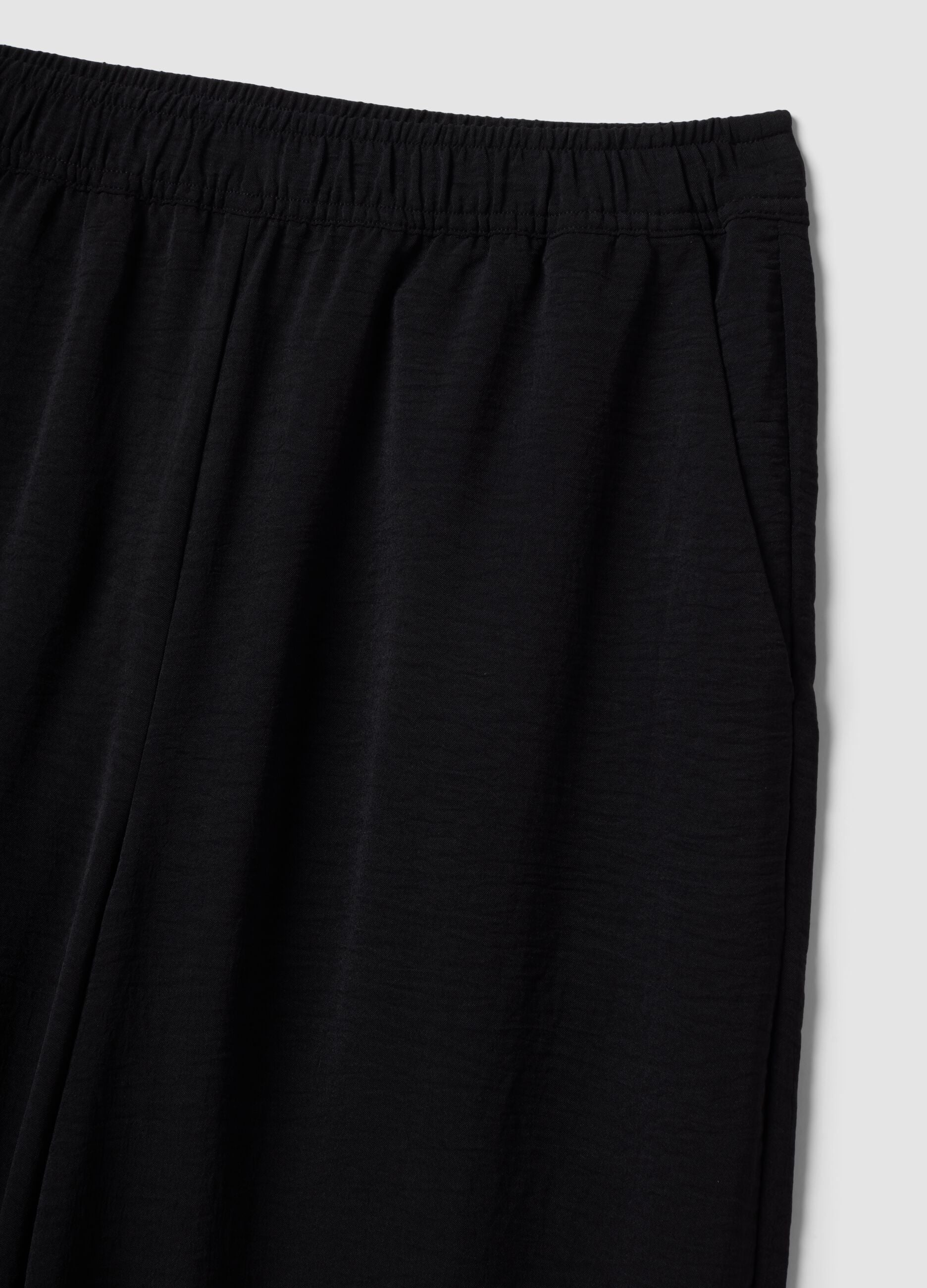 Black wide-leg trousers with elasticated waist