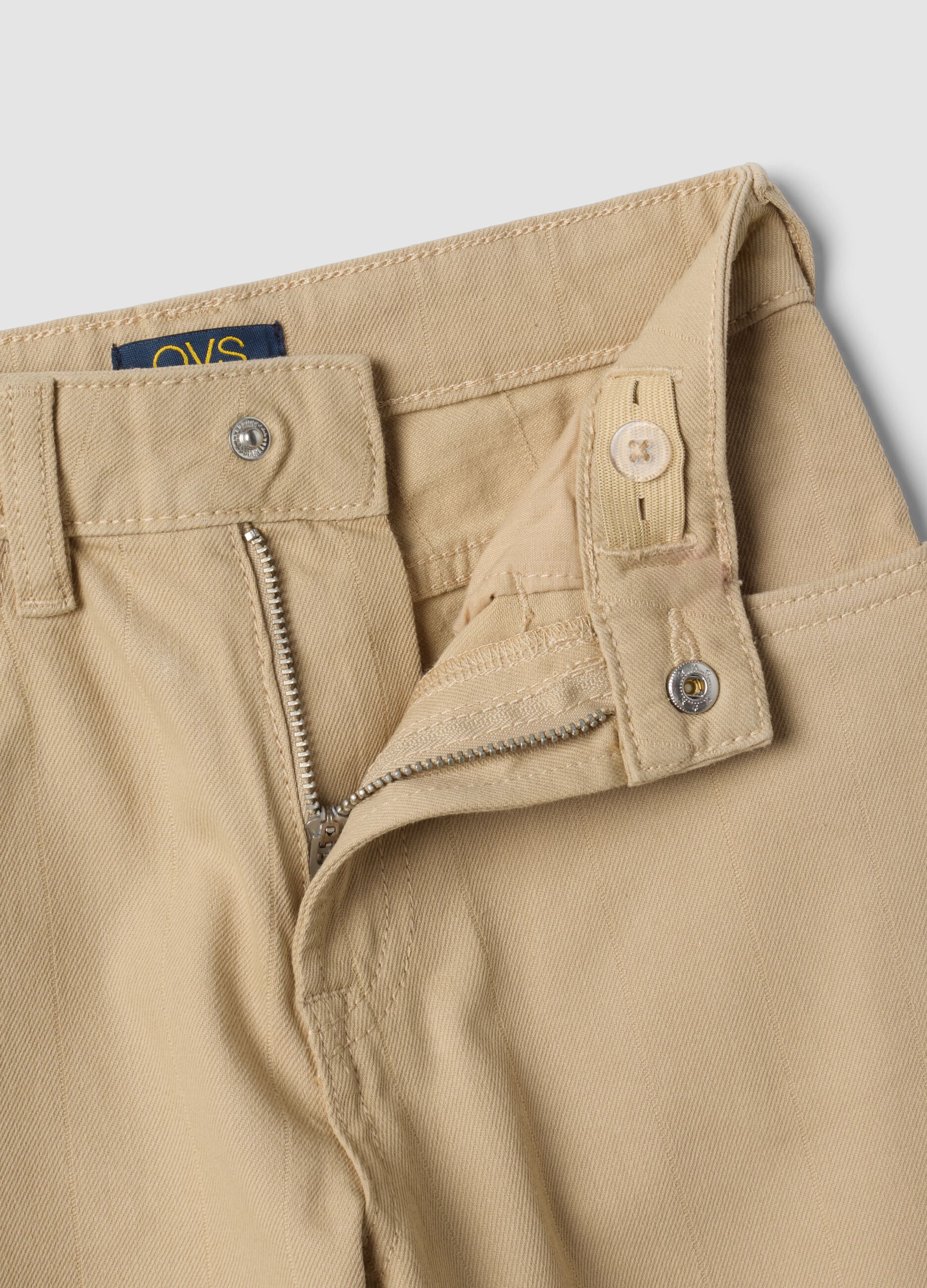Pantaloni beige in cotone elasticizzato relaxed fit per bambino