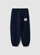 Pantaloni jogger blu in puro cotone con vita elasticizzata per bambino_1