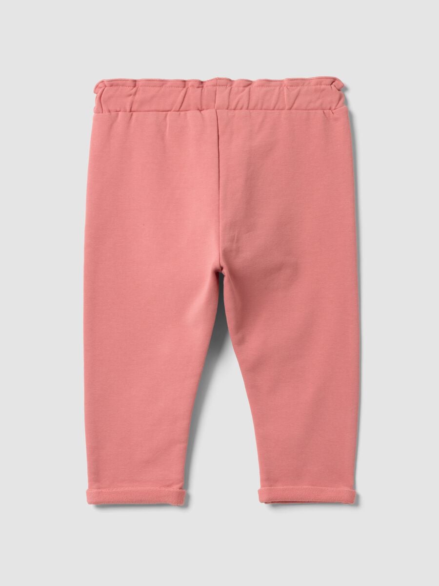 Pink stretch cotton joggers with turn-up hem for baby girl_1