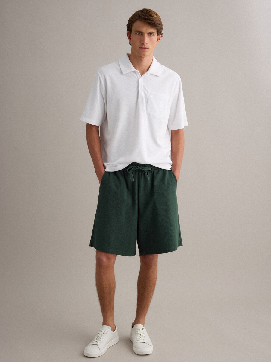Green cotton-blend jogger shorts with drawstring, relaxed fit_0