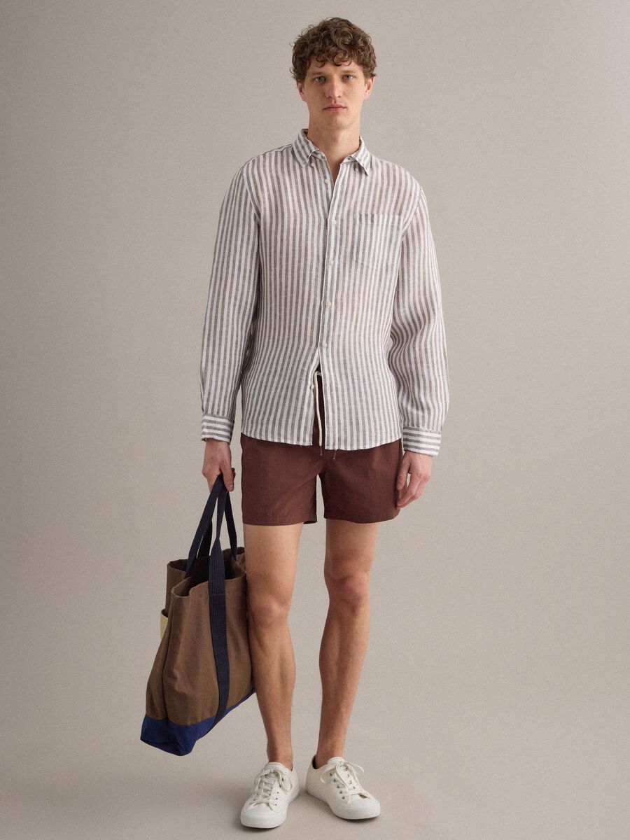 Brown swim shorts with elasticated waistband and drawstring_1