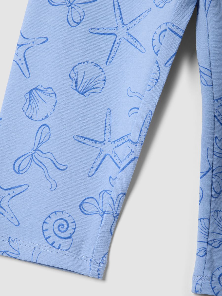 Leggings skinny azul-claro em algod&atilde;o el&aacute;stico para menina com estampados_3