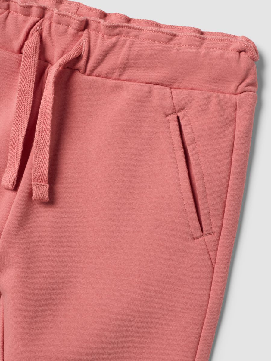 Pink stretch cotton joggers with turn-up hem for baby girl_2