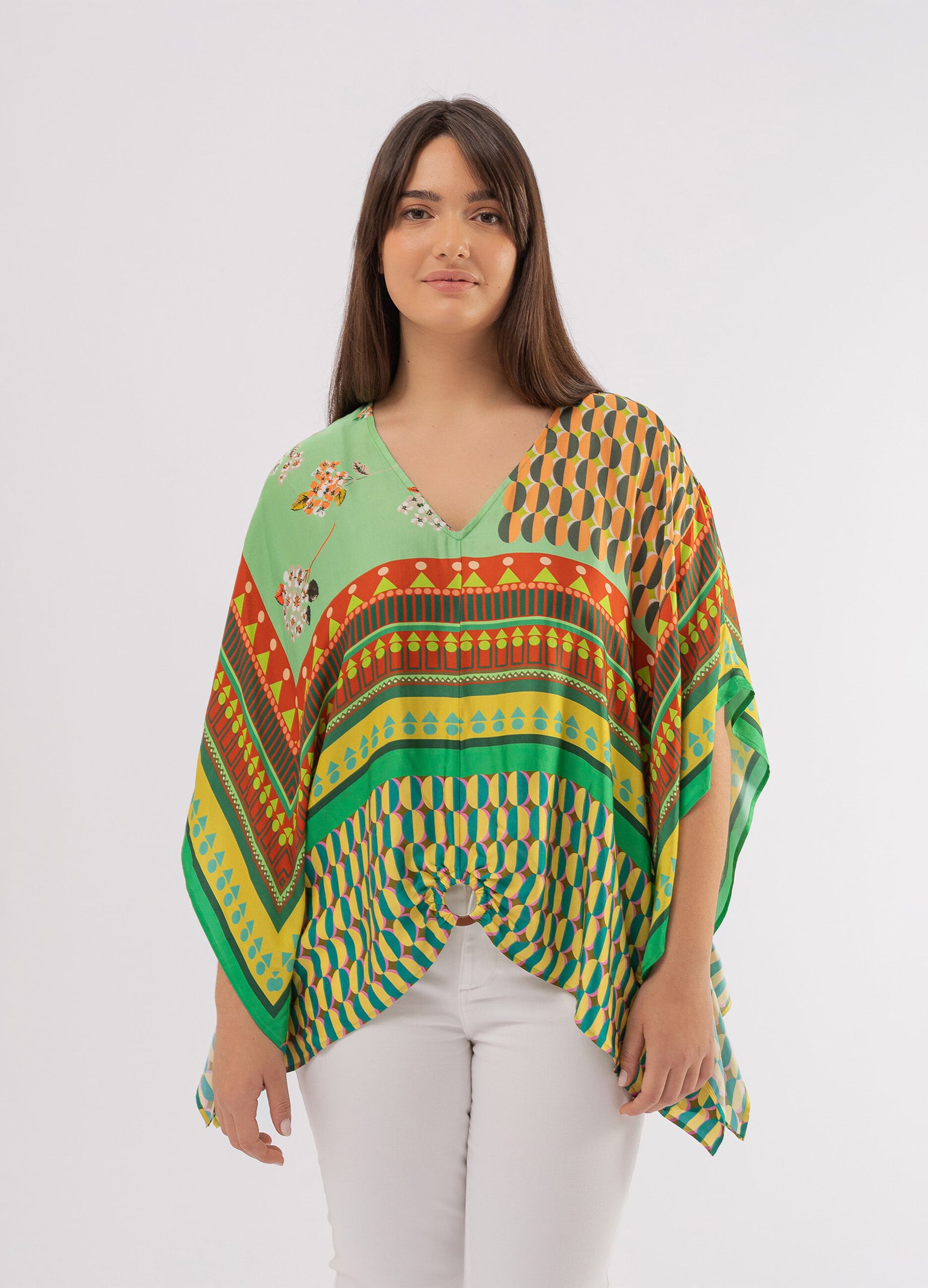Curvy poncho with ring and multicoloured print