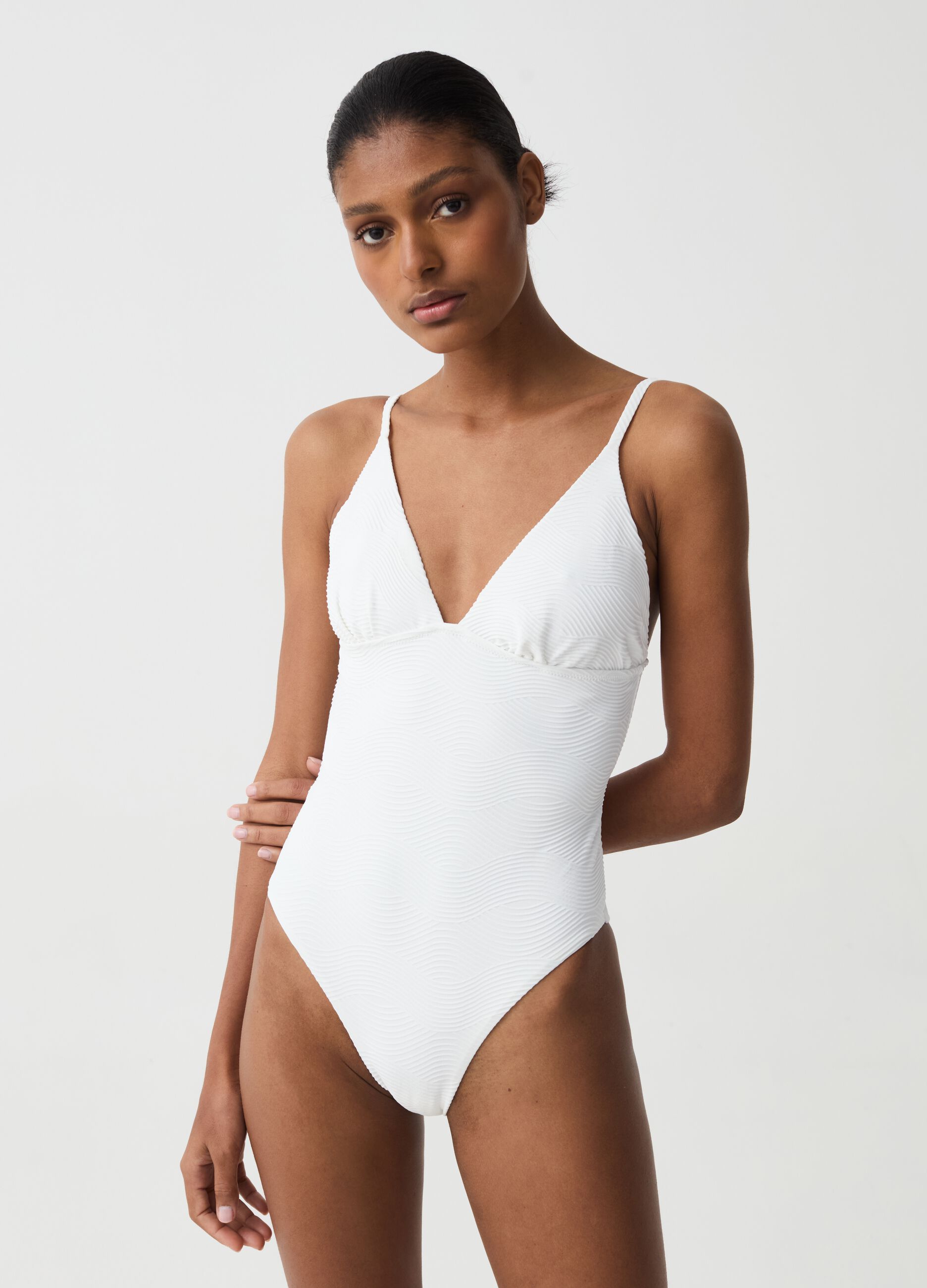 One-piece swimsuit with wave design