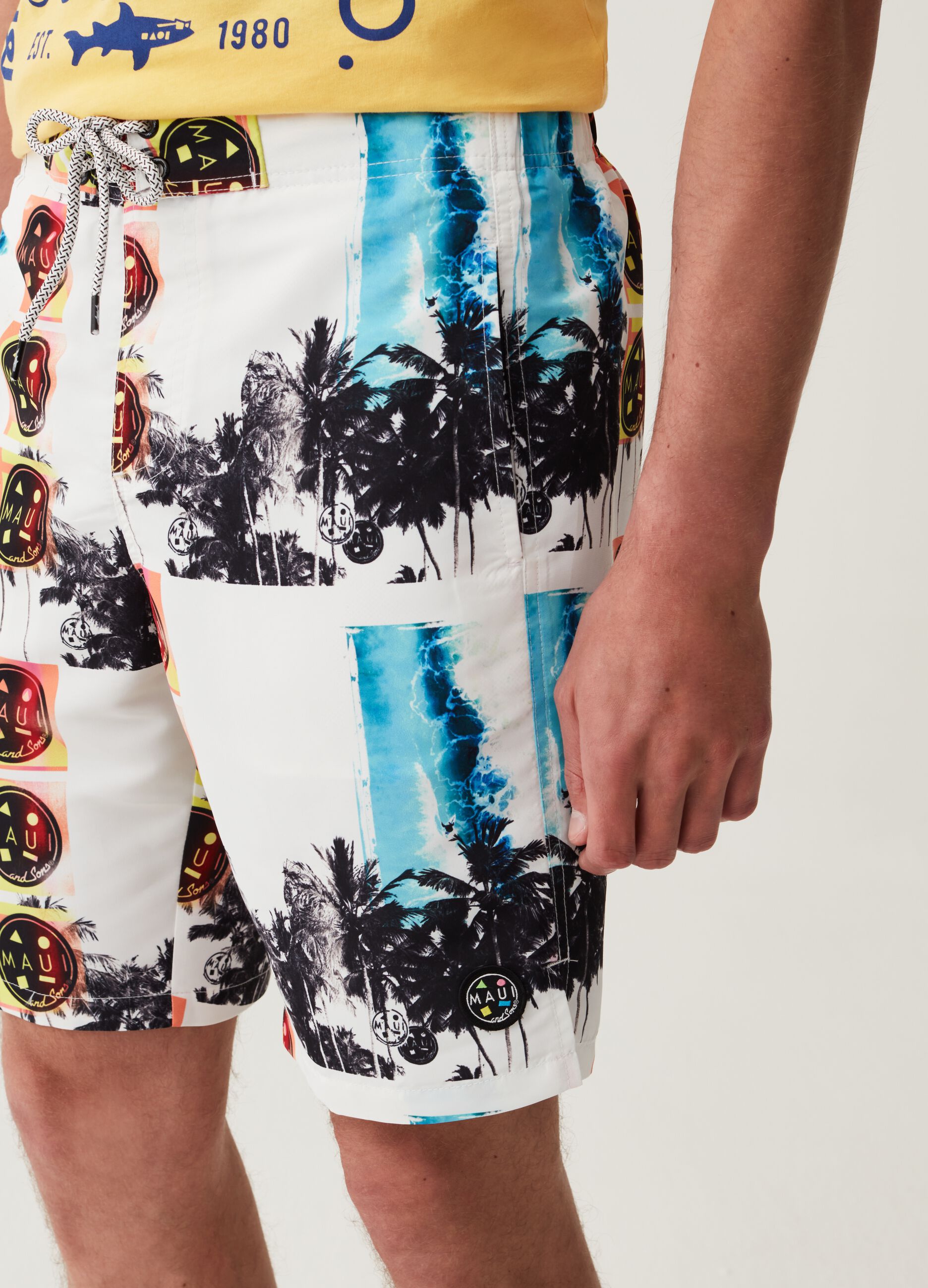 Maui and Sons Bermuda swimming trunks with palms print