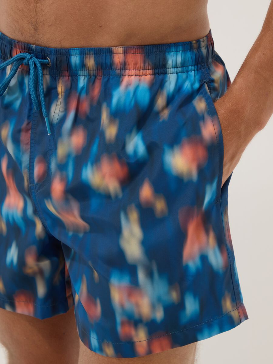 Blue boxer swim shorts with multicolour gradient print_3