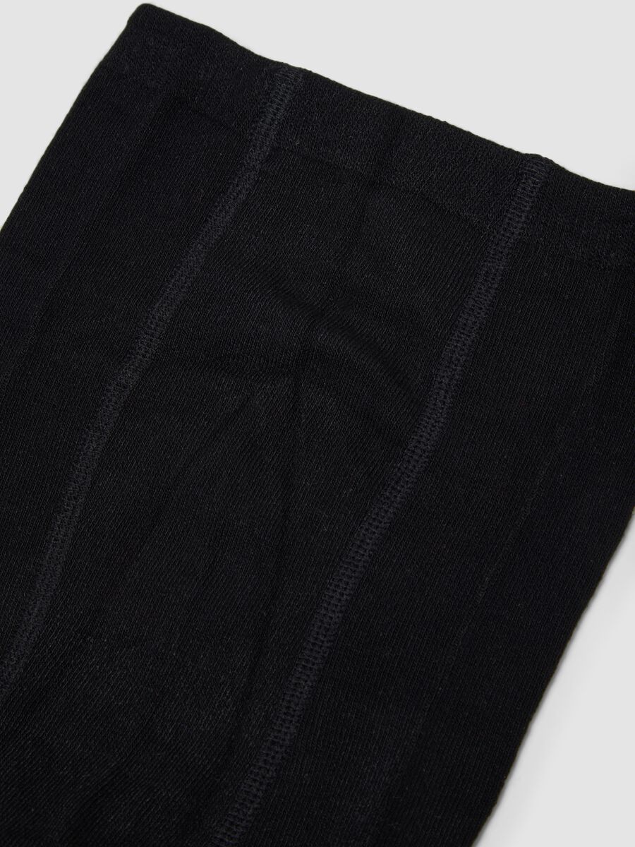 Collant neri in tessuto elasticizzato con fiocchetto_2