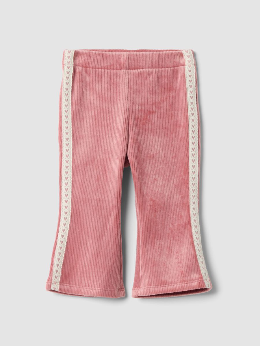 Pantaloni flare rosa in tessuto elasticizzato a costine_0
