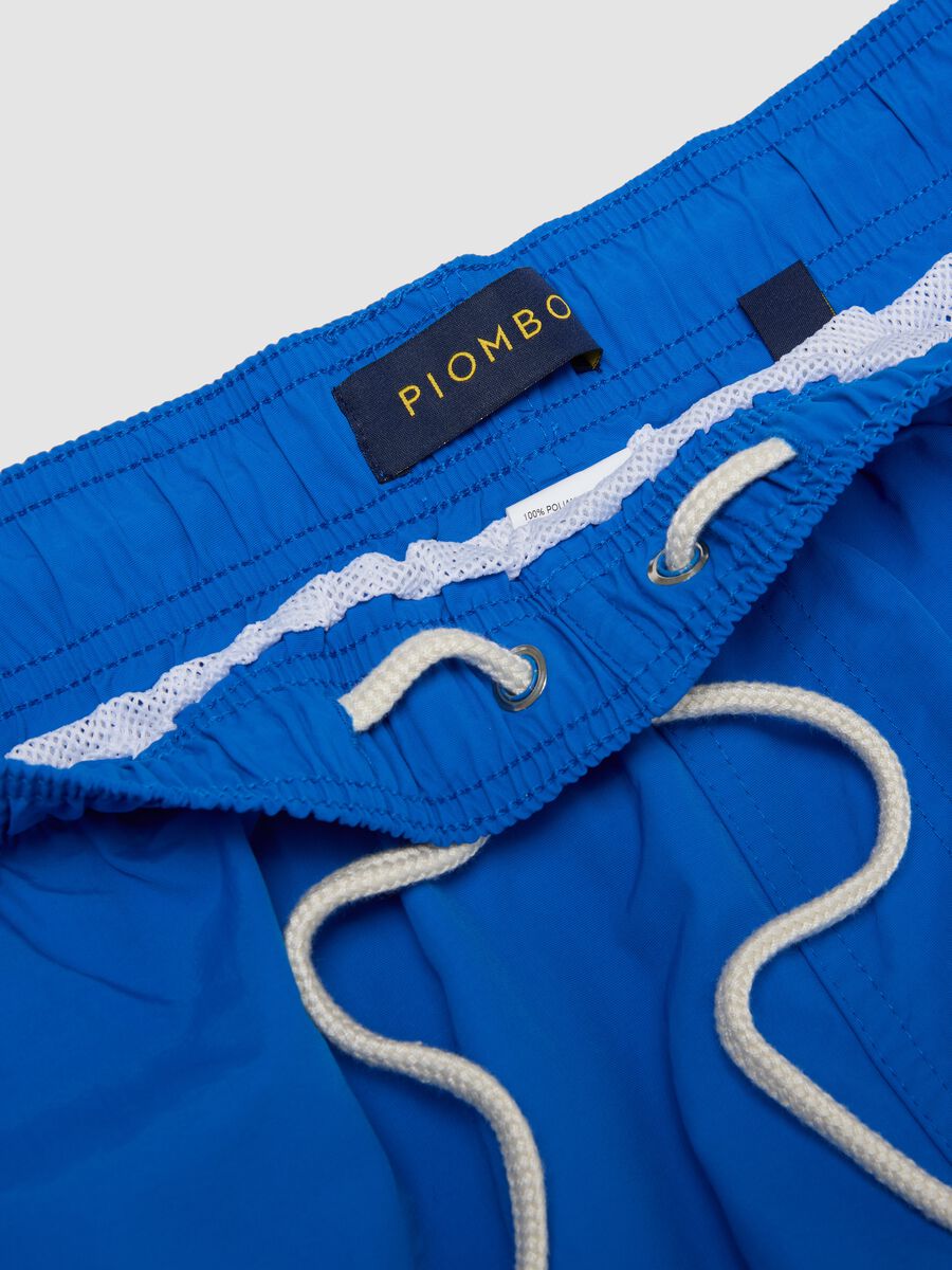 Blue swim shorts with elasticated waist and drawstring_5
