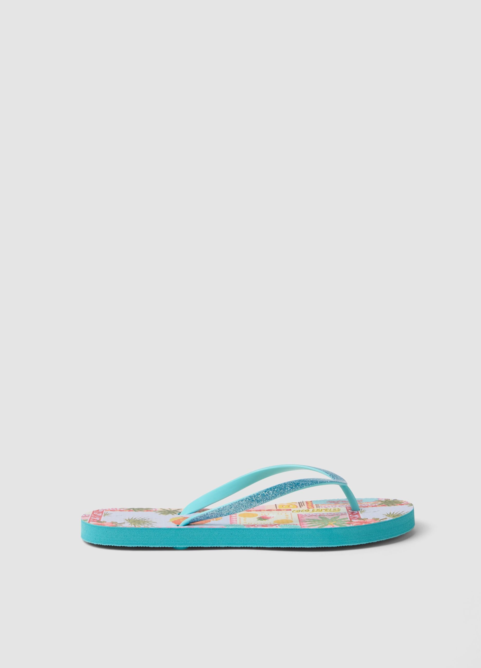 Blue multicolour tropical print flip-flops