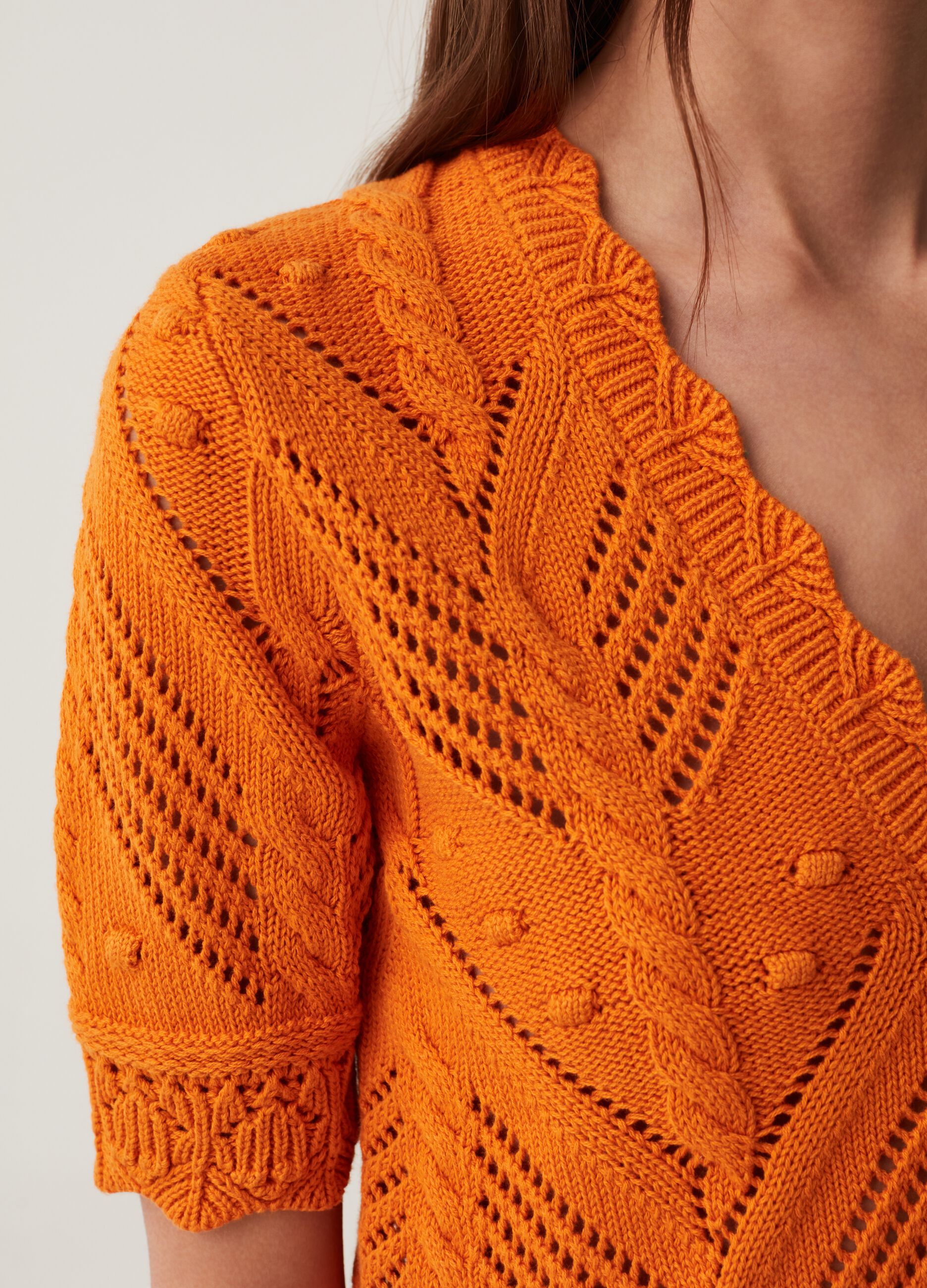 Crochet cardigan with cable detail.