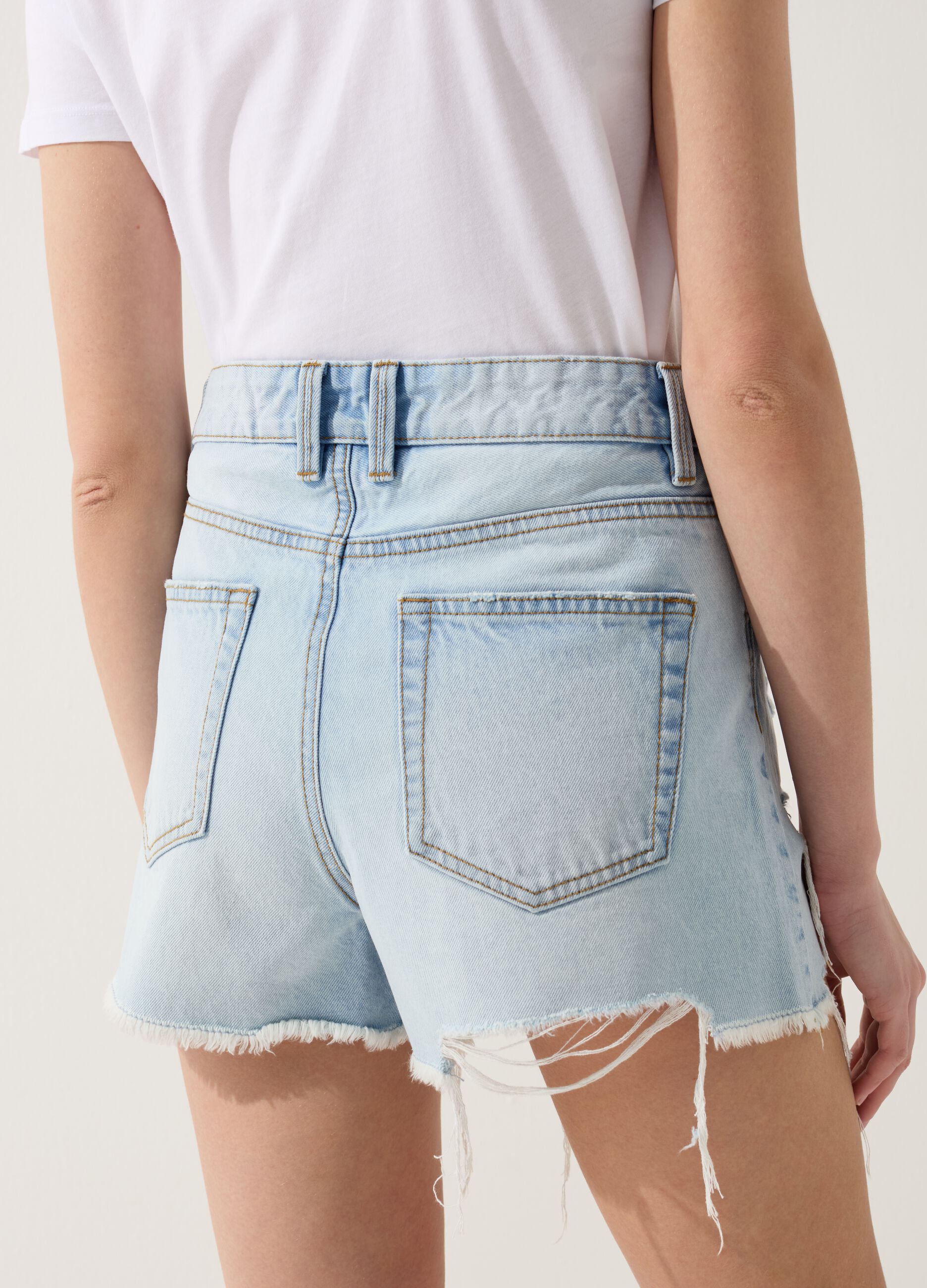 Denim shorts with rips and high waist