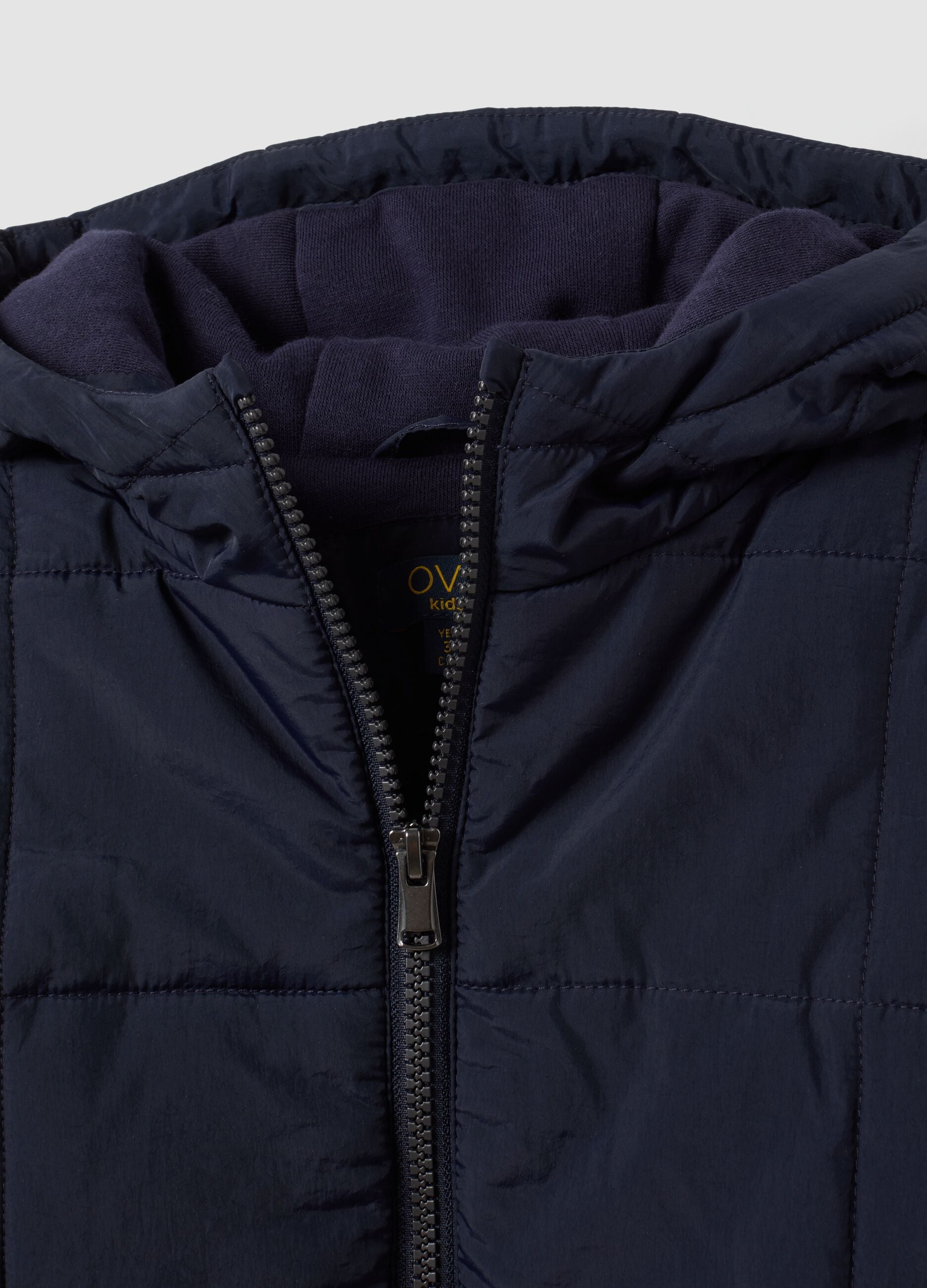 Giubbotto blu navy imbottito con cappuccio e zip per bambino