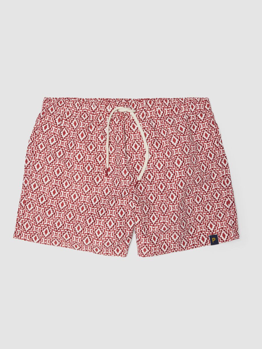 Red swim shorts with geometric print_4