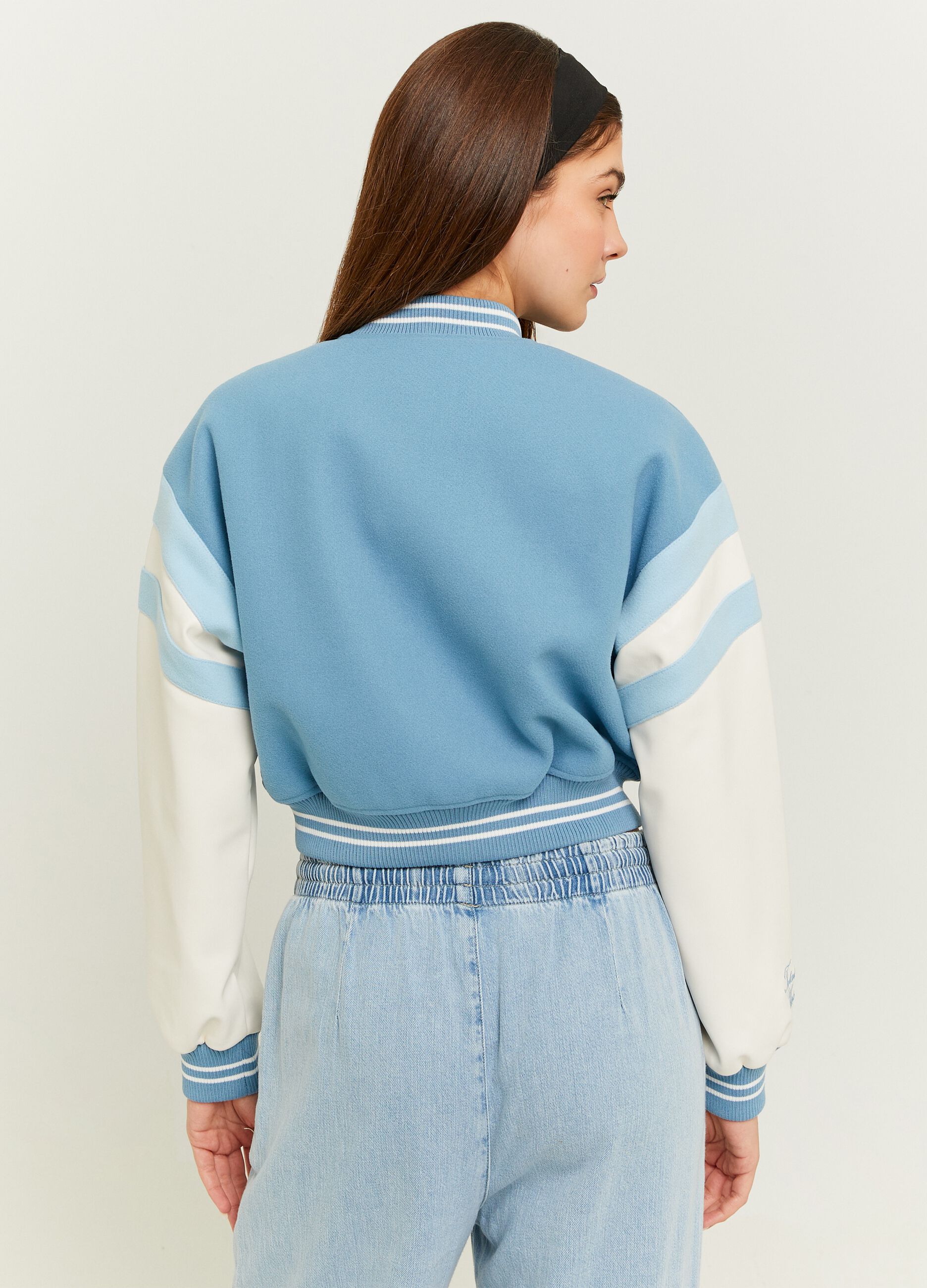 Varsity bomber jacket with embroidery and bouclé application