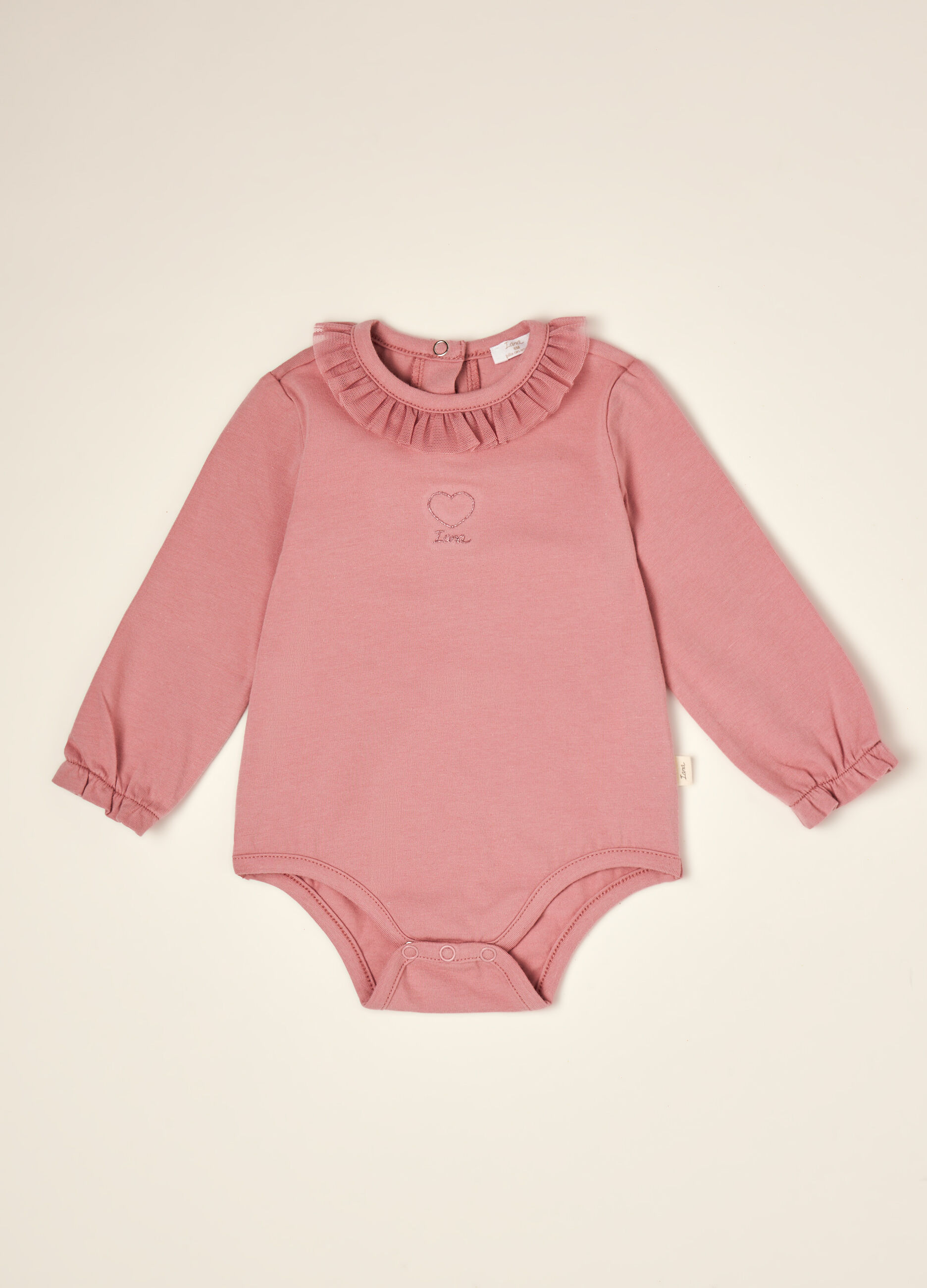 Pink organic stretch cotton bodysuit with ruffled crew neck