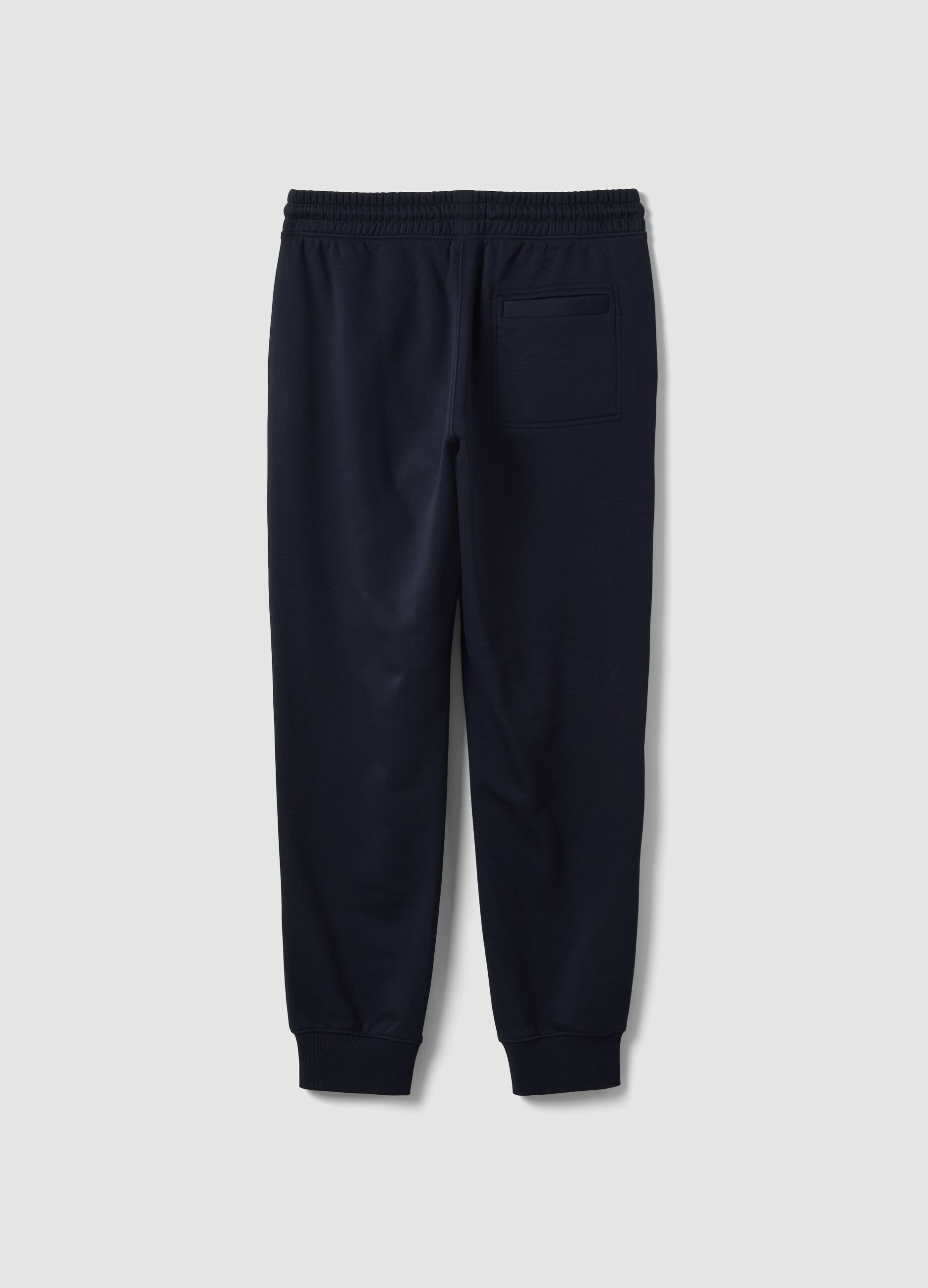 Blue cotton-blend joggers with cuffed hem and drawstring
