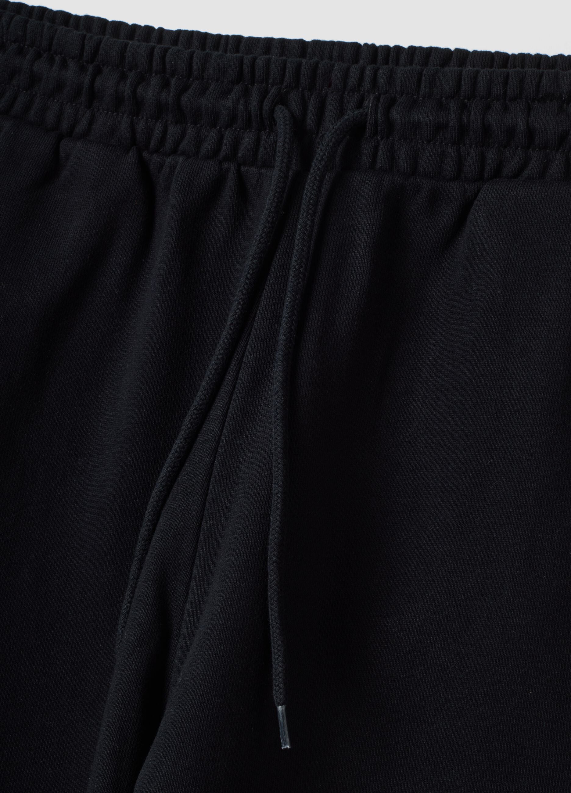 Schwarze Jogger aus reiner Baumwolle mit elastischem Bund, Oversize-Fit