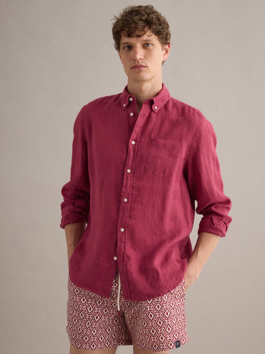 Red swim shorts with geometric print_0