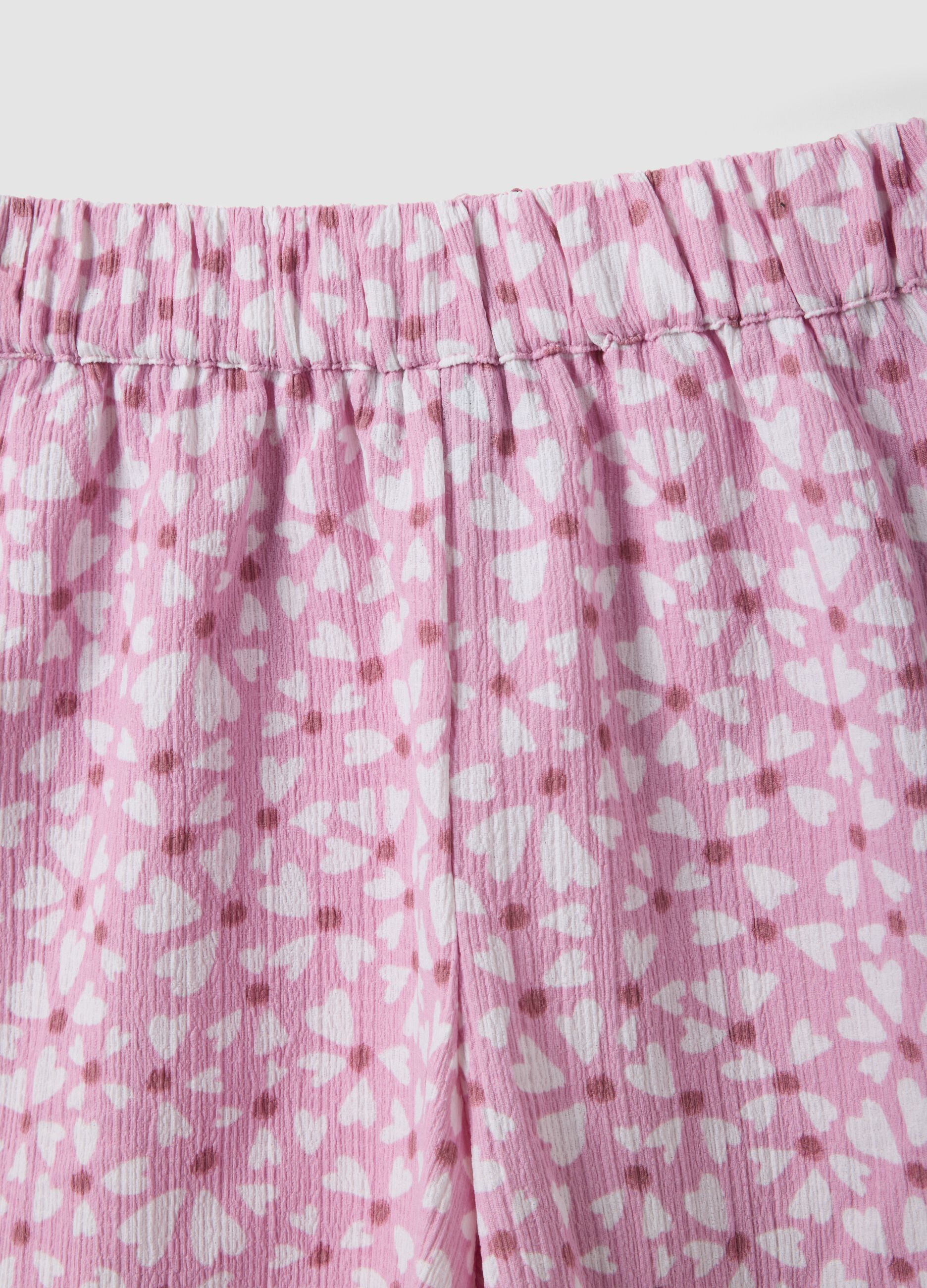 Pink stretch-fabric set with top and shorts