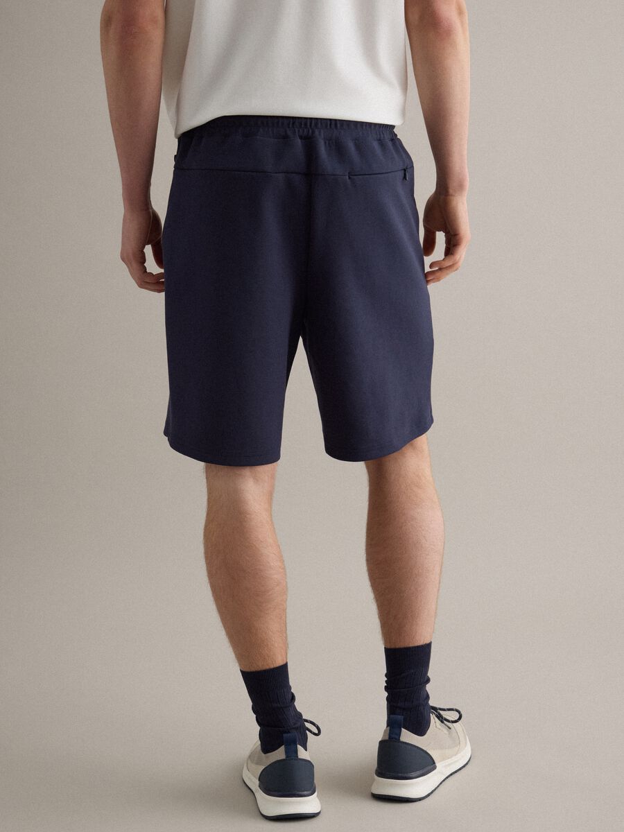 Blue regular fit stretch cotton blend shorts_1