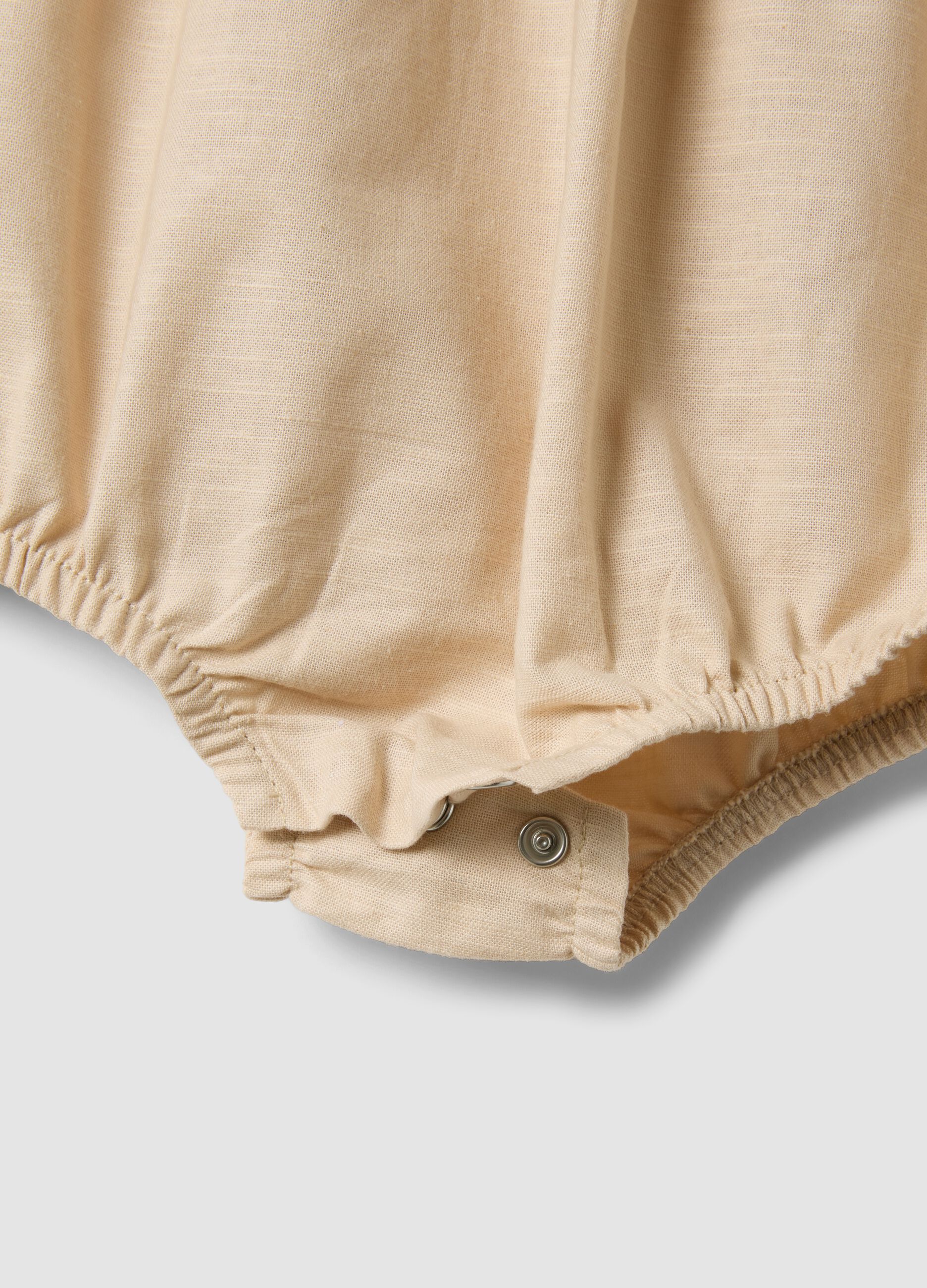 Beige organic cotton baby romper