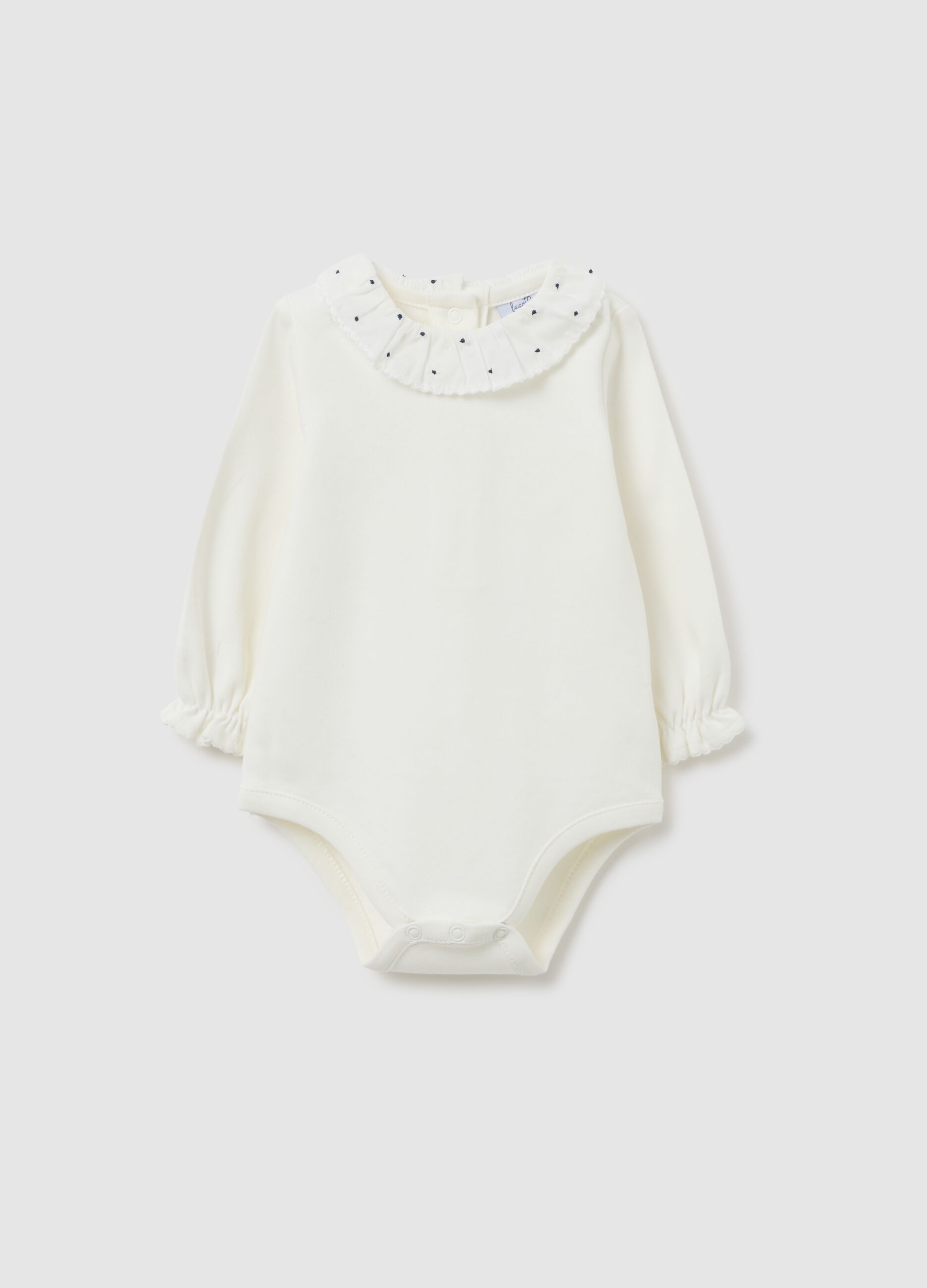 White baby bodysuit in pure cotton with ruffled collar