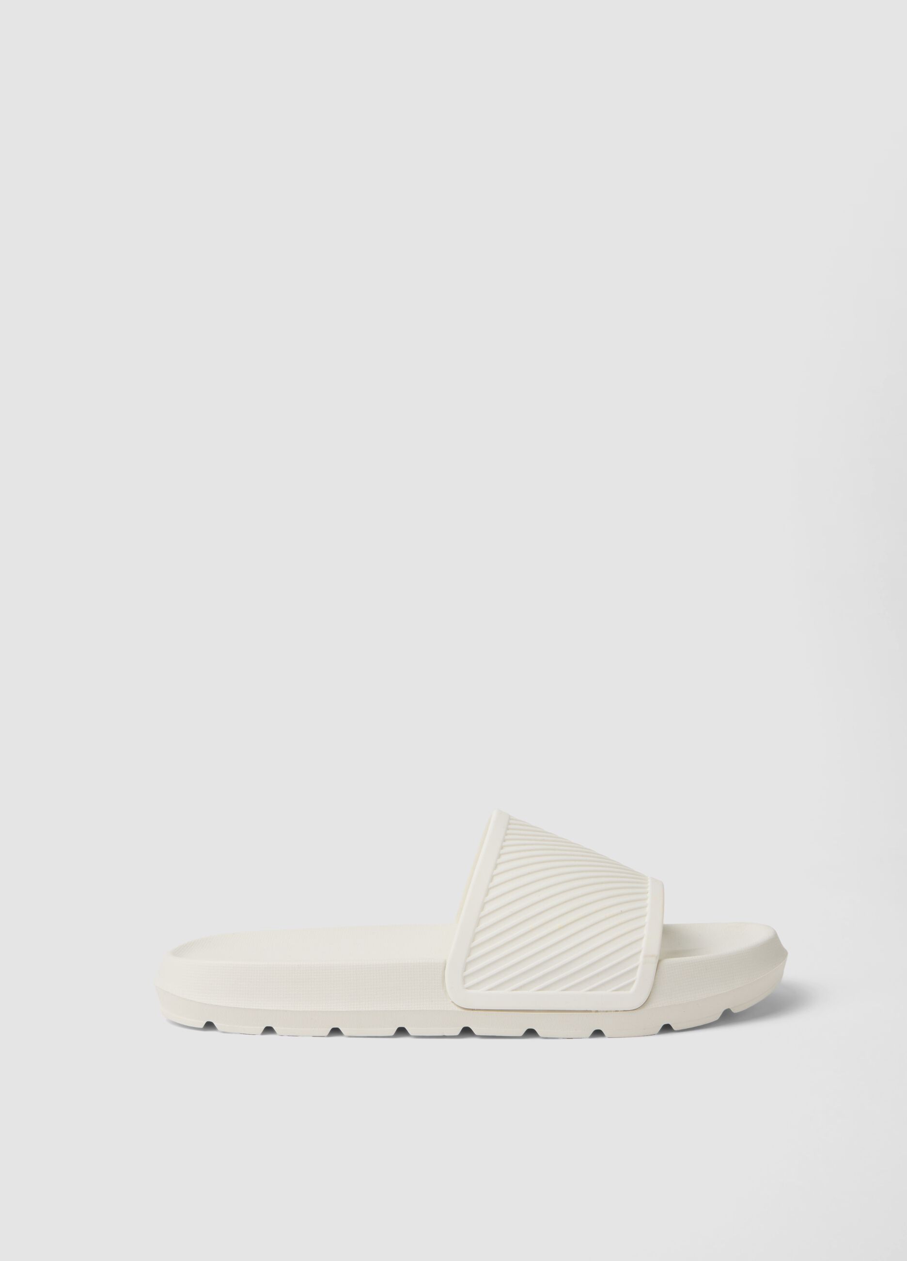 White slide sandals with wide strap