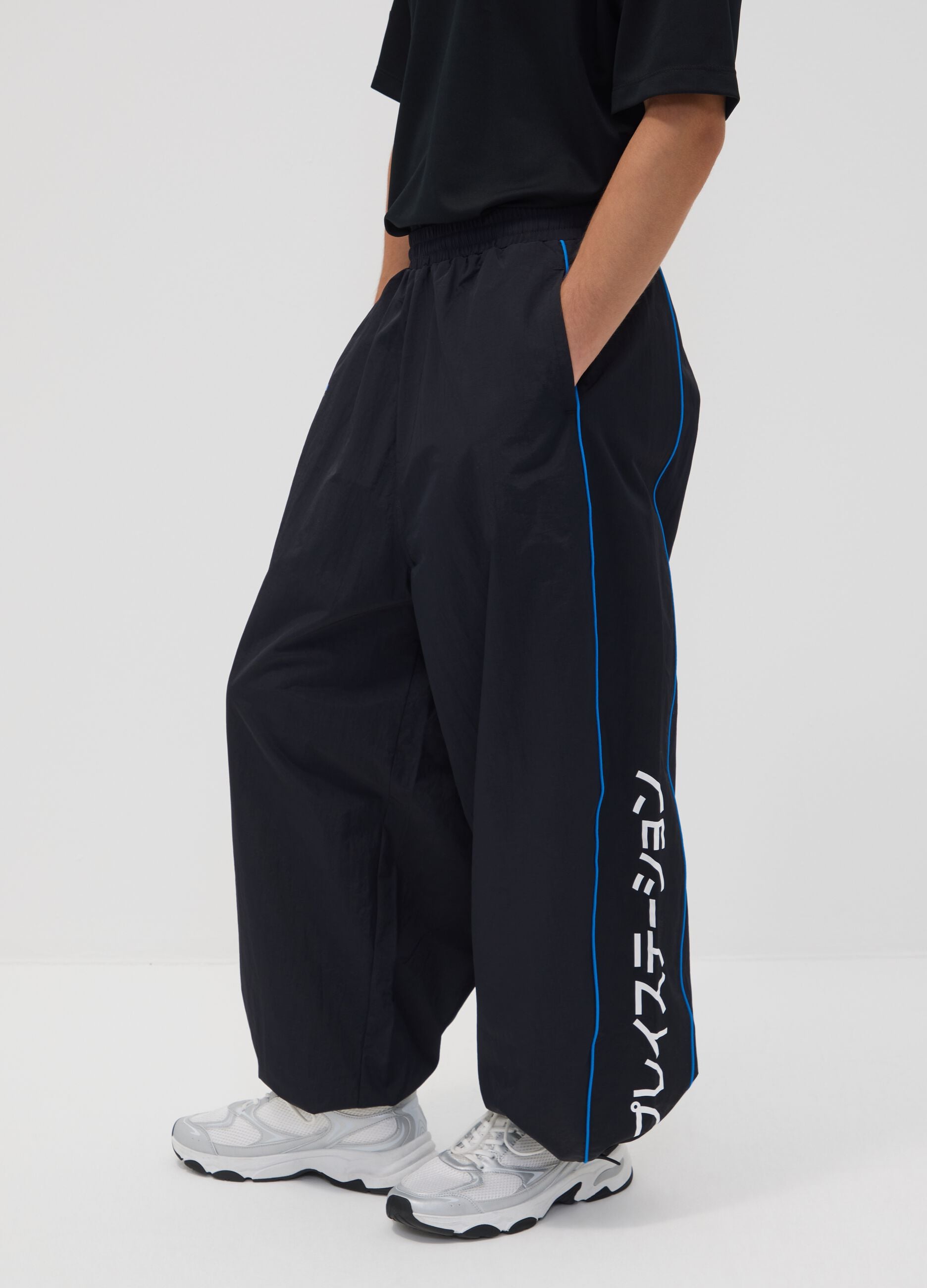 Black PlayStation fitness trousers with contrast piping