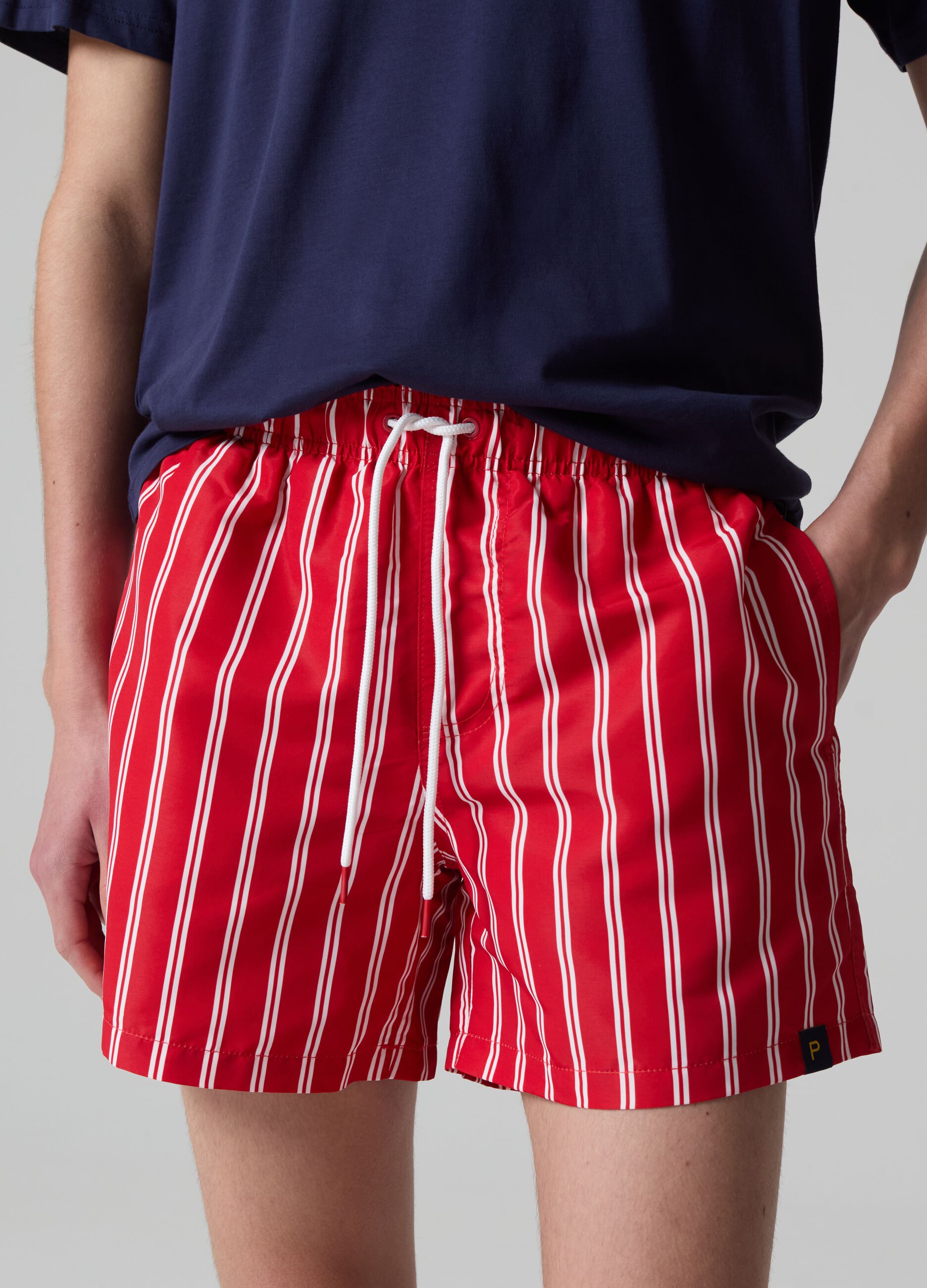 Bermuda swim shorts with fine stripes