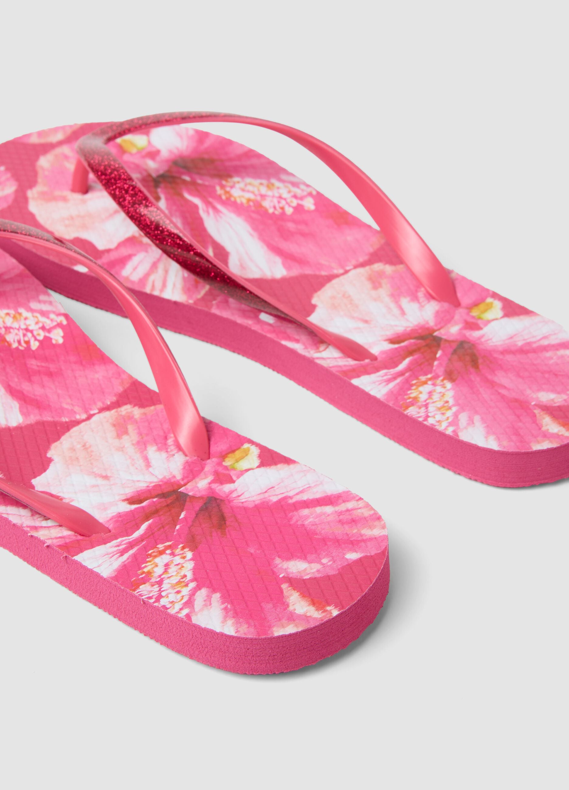 Pink floral-print flip-flops