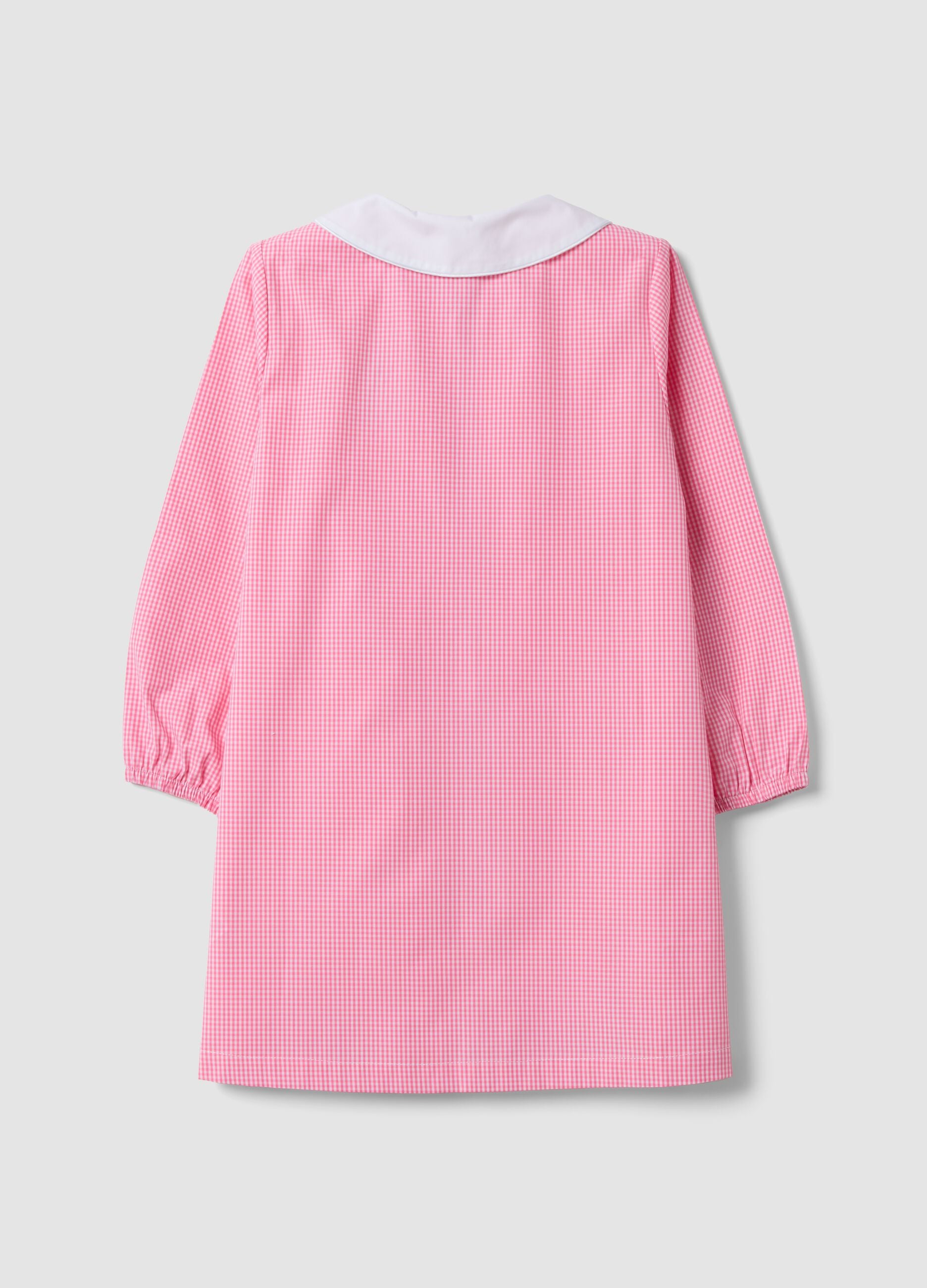 Pink gingham nursery apron with white collar and Minnie embroidery
