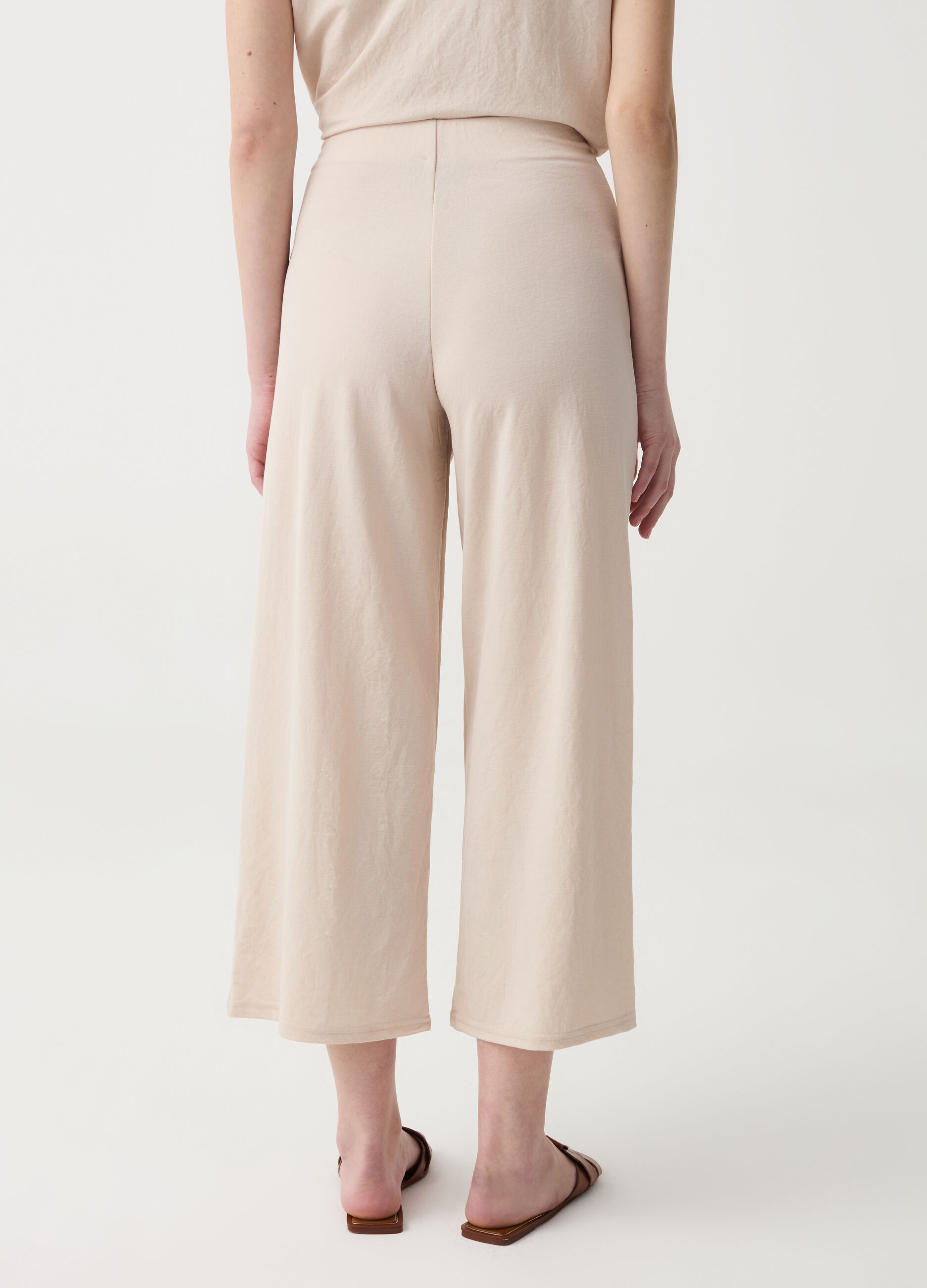 Wide-leg trousers with wraparound fastening