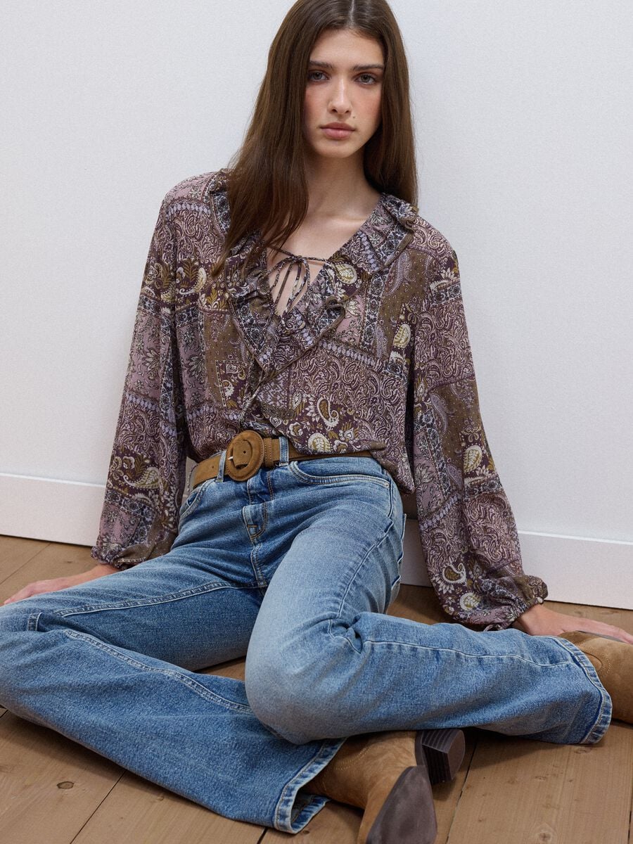 Purple patterned blouse with ruffles and tie neck_0
