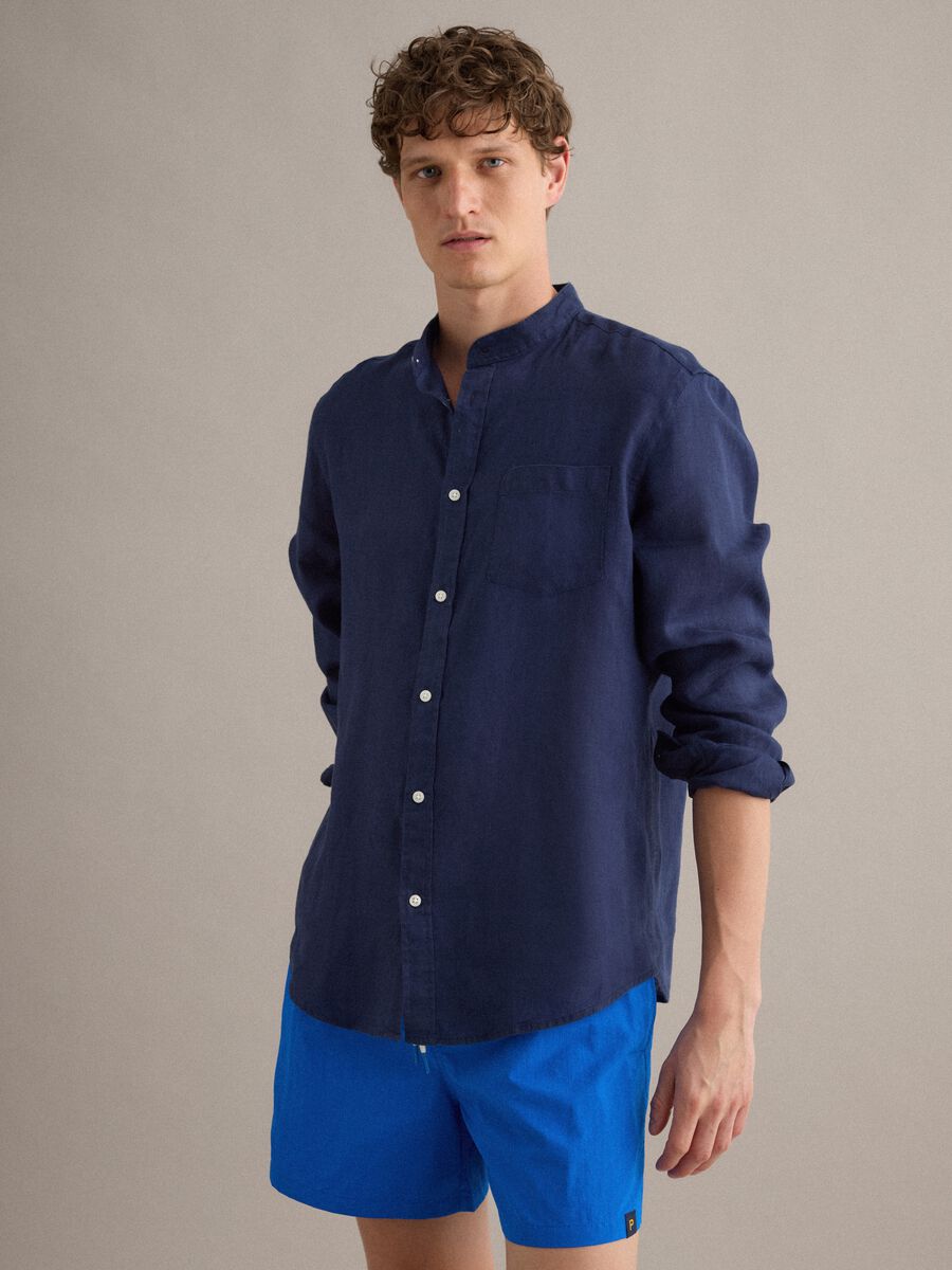 Blue swim shorts with elasticated waist and drawstring_1