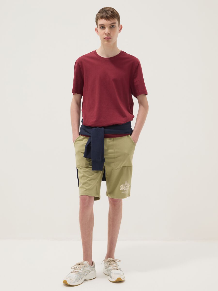 Green pure cotton jogger shorts for boys with elasticated waistband_0