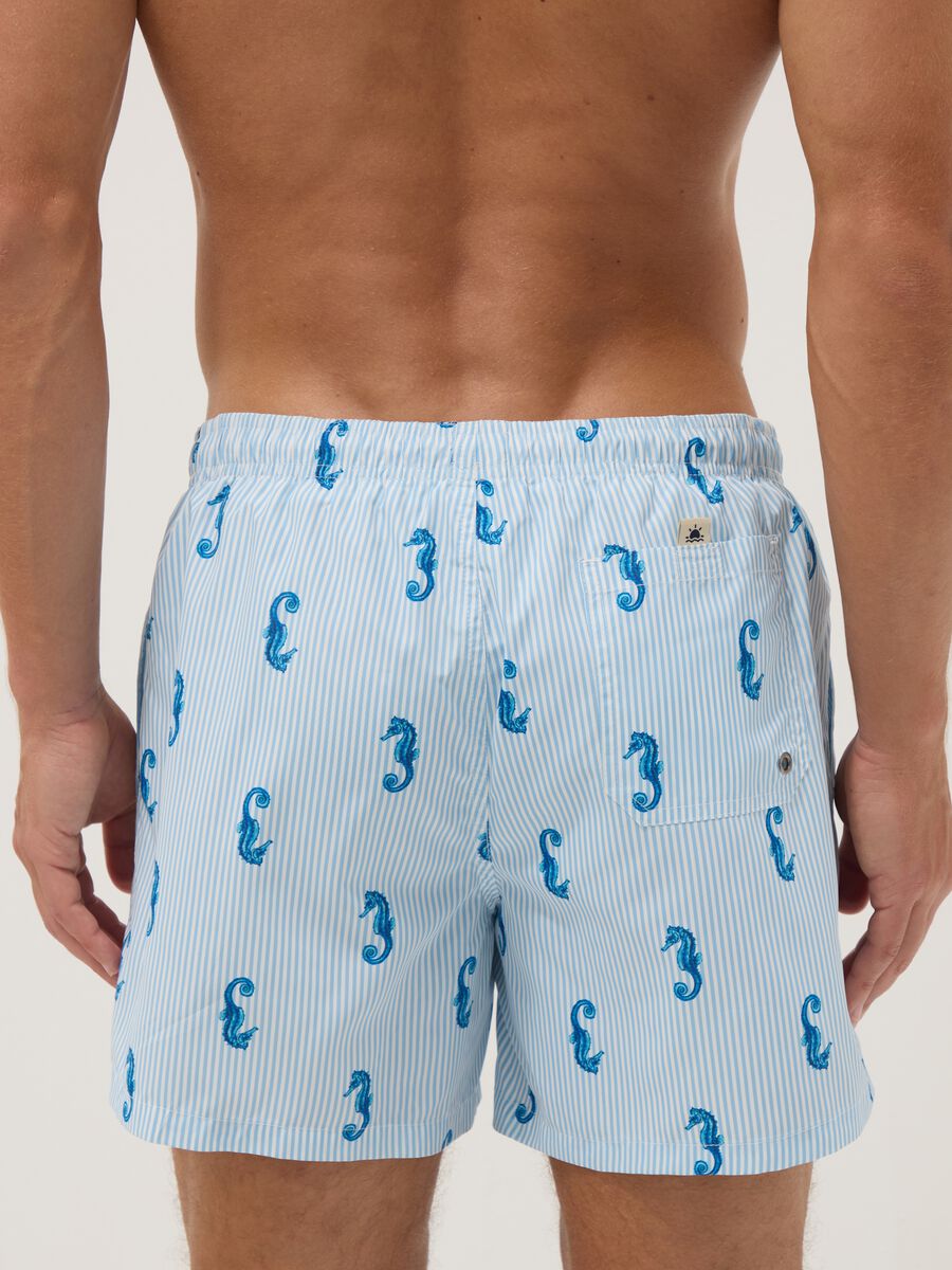 Blue striped swim shorts with seahorse print_2