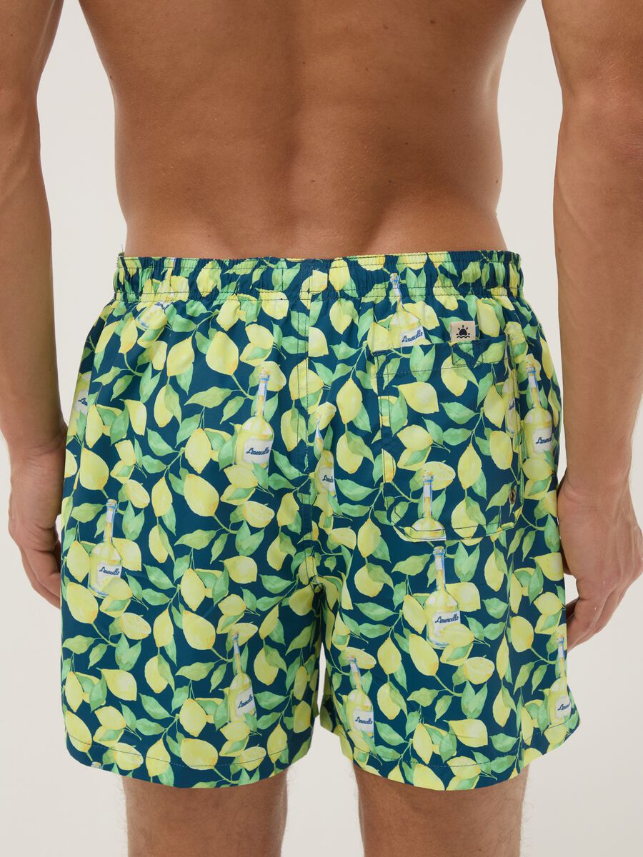 Blue boxer swim shorts with Limoncello print_2