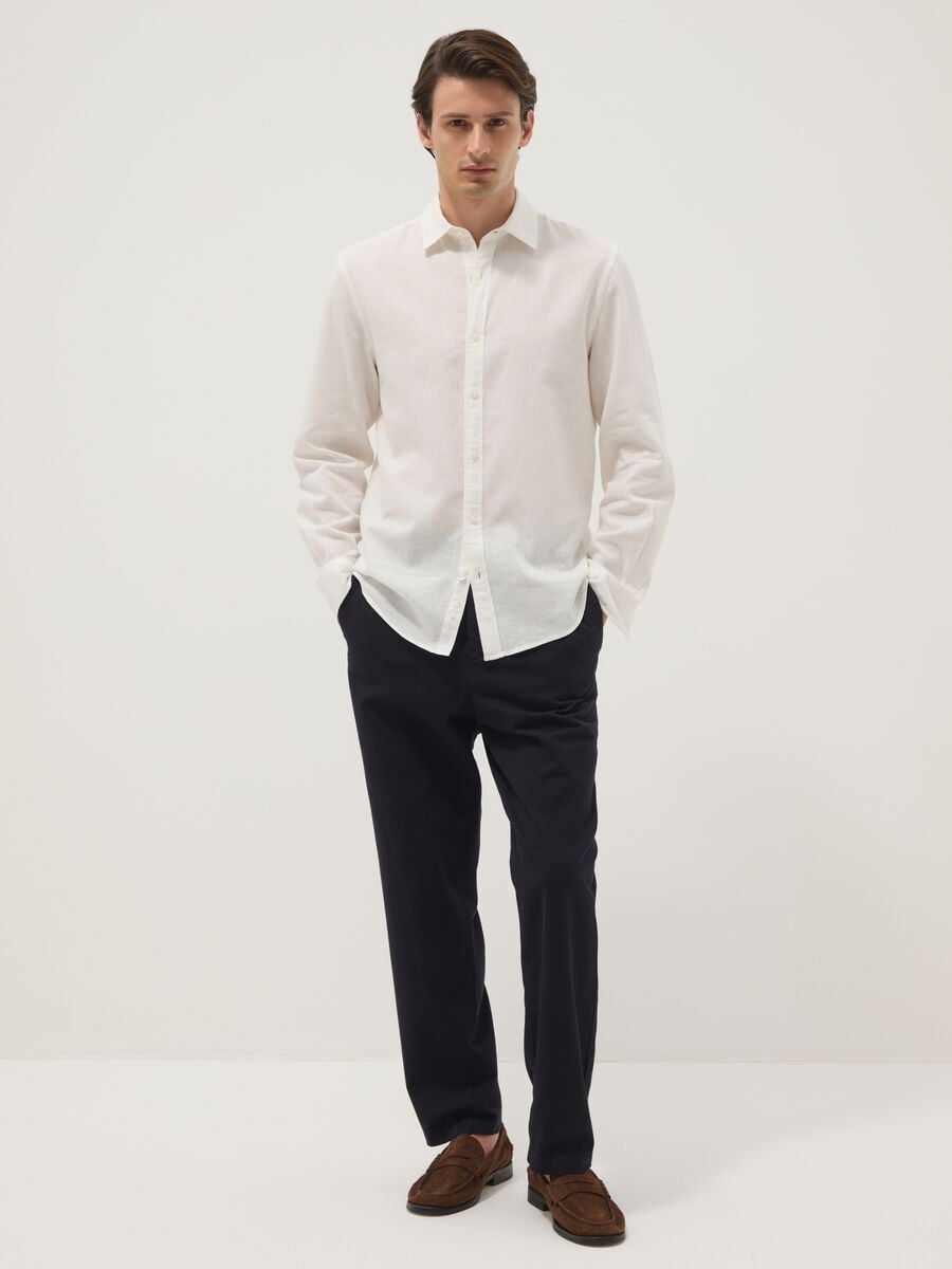 Black pure cotton carrot-fit chino trousers_0