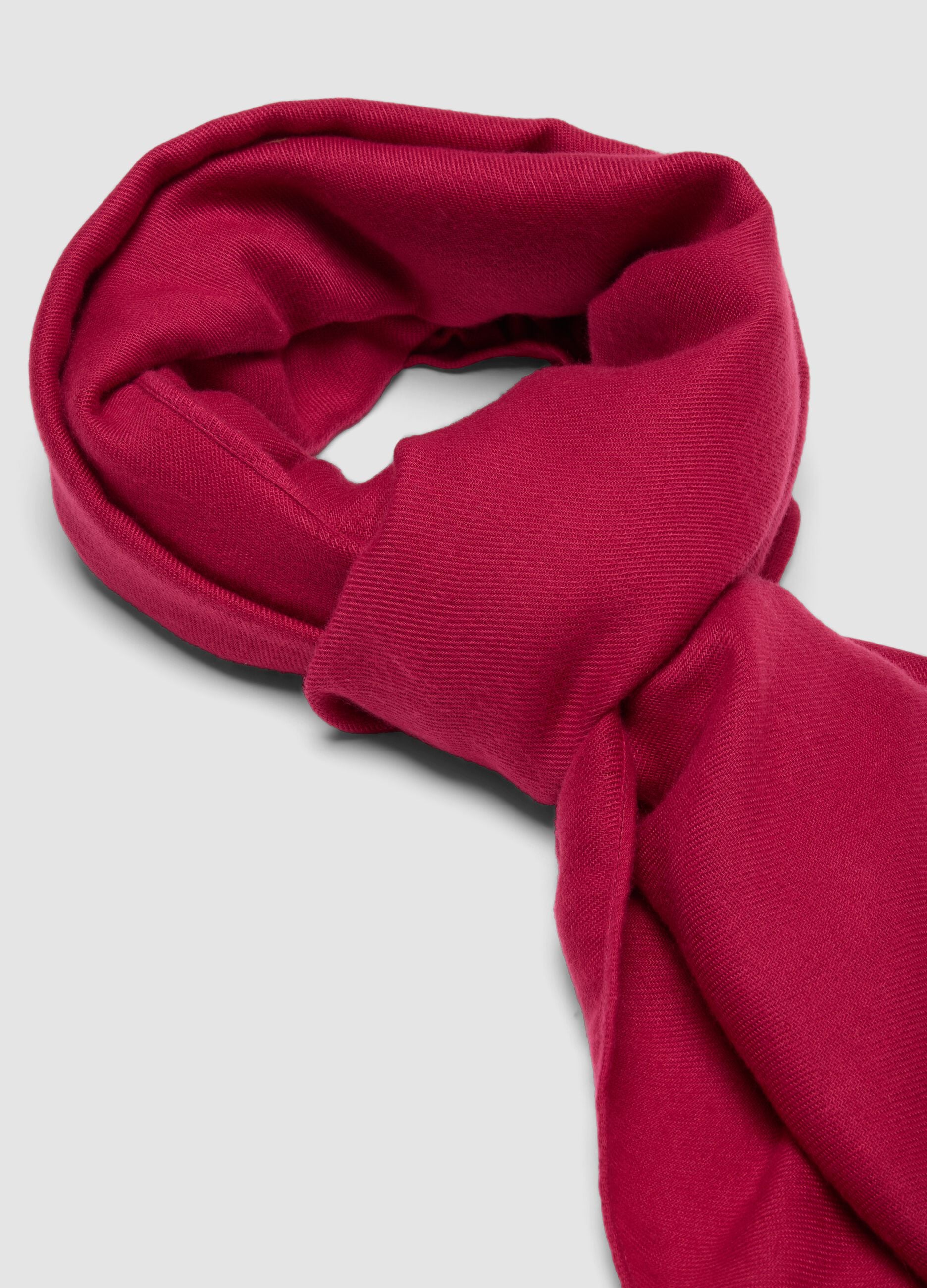Pink fringed scarf