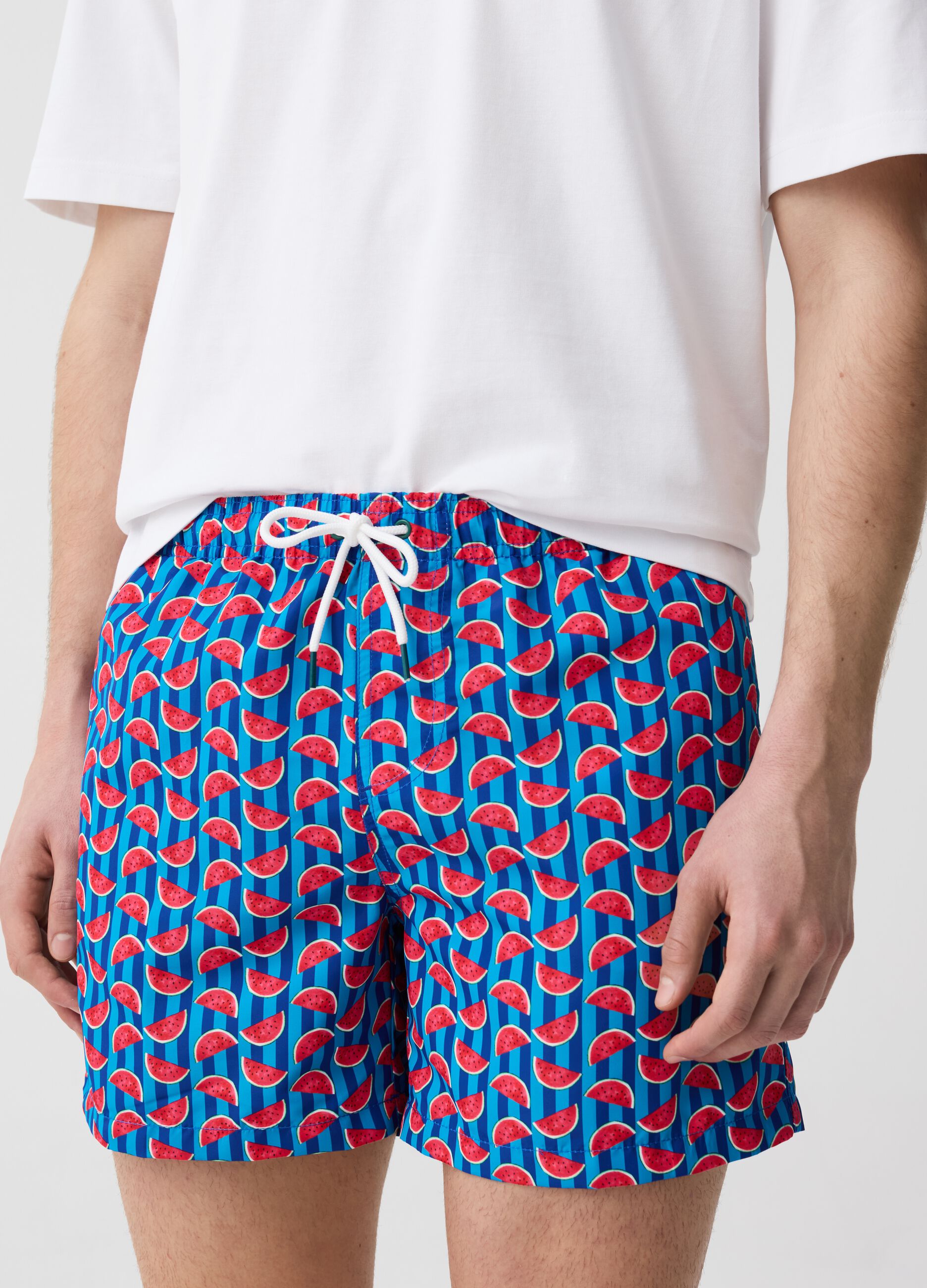 Striped swimming trunks with watermelon print