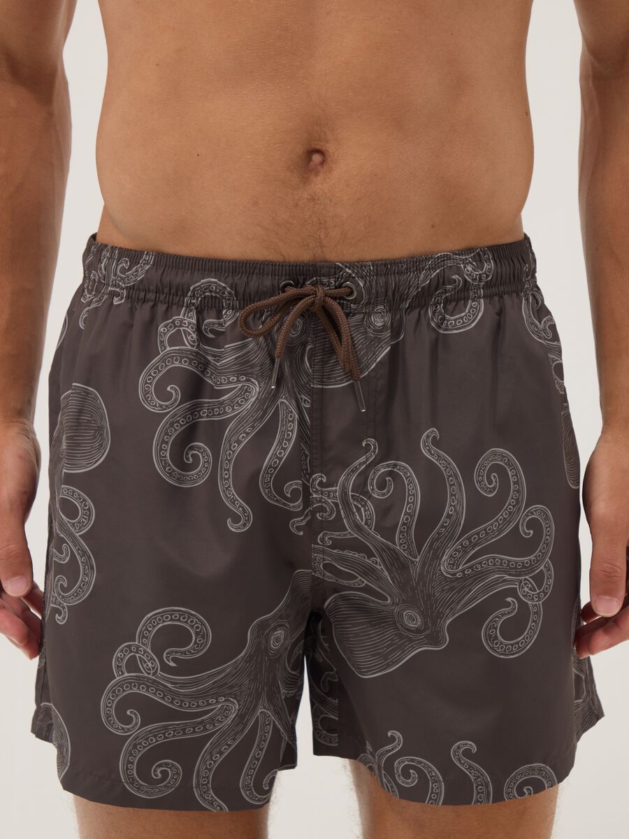 Brown swim shorts with all-over print_1