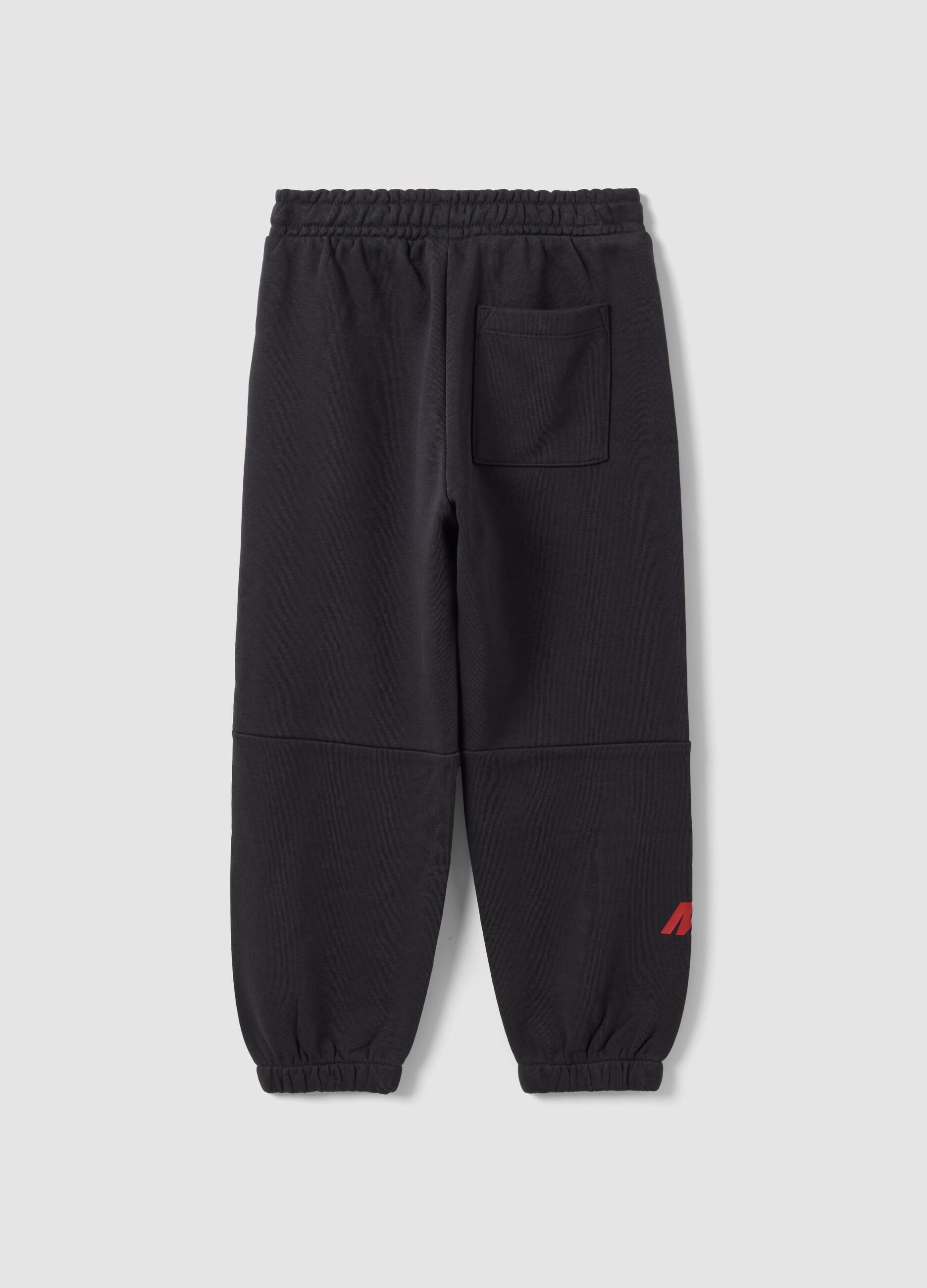 Black cotton-blend joggers with elasticated waist and Mickey print