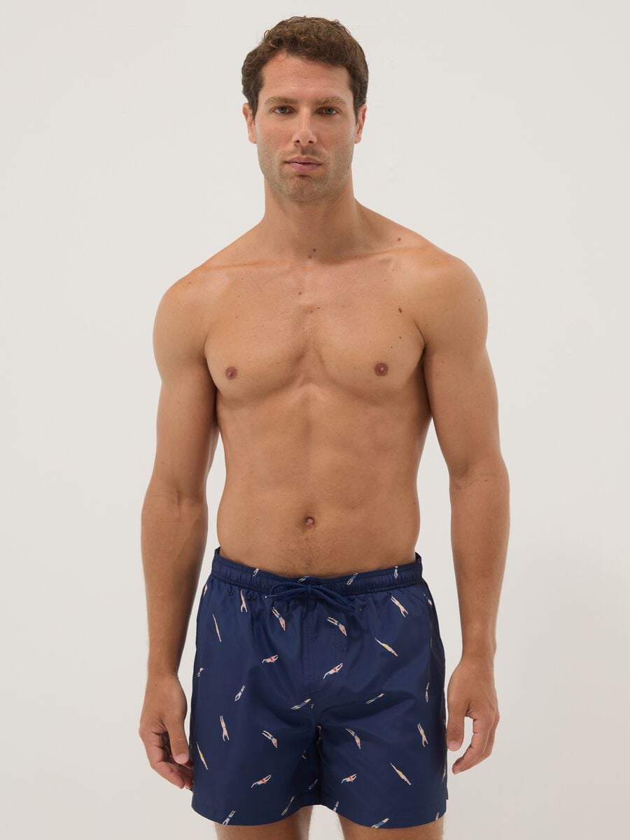 Blue boxer swim shorts with all-over print_0