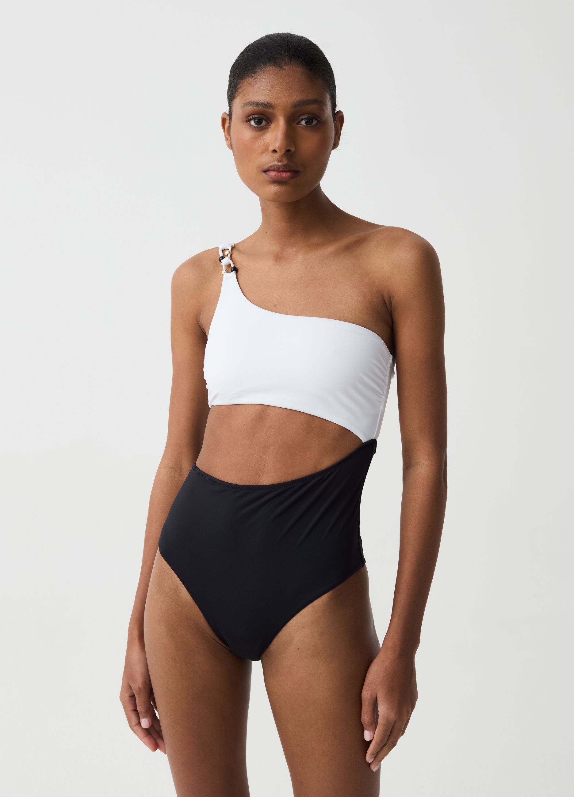 Two-tone one-piece swimsuit with one shoulder strap